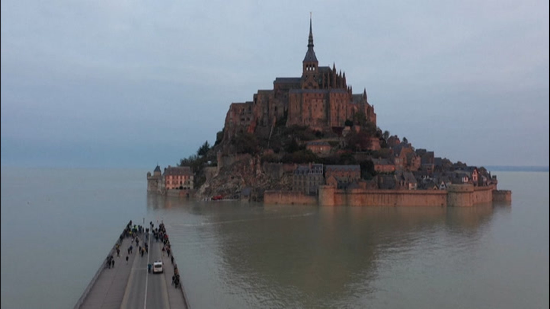 France's Mont-Saint-Michel deals with a rare phenomenon in which it becomes an island as high tide sweeps in. The tide could be seen cutting the area off on Oct. 18.