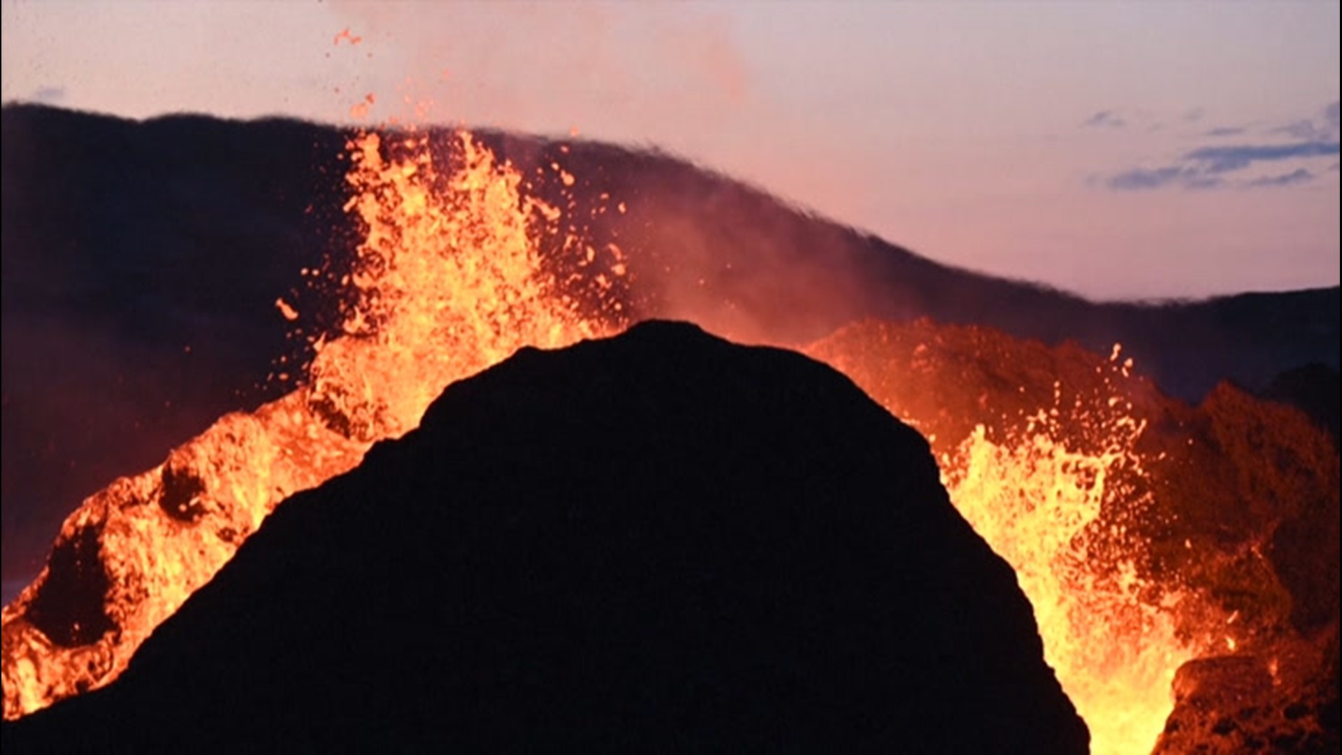 An erupting volcano near Fagradalsfjall, Iceland, has been visible from miles away since early May.