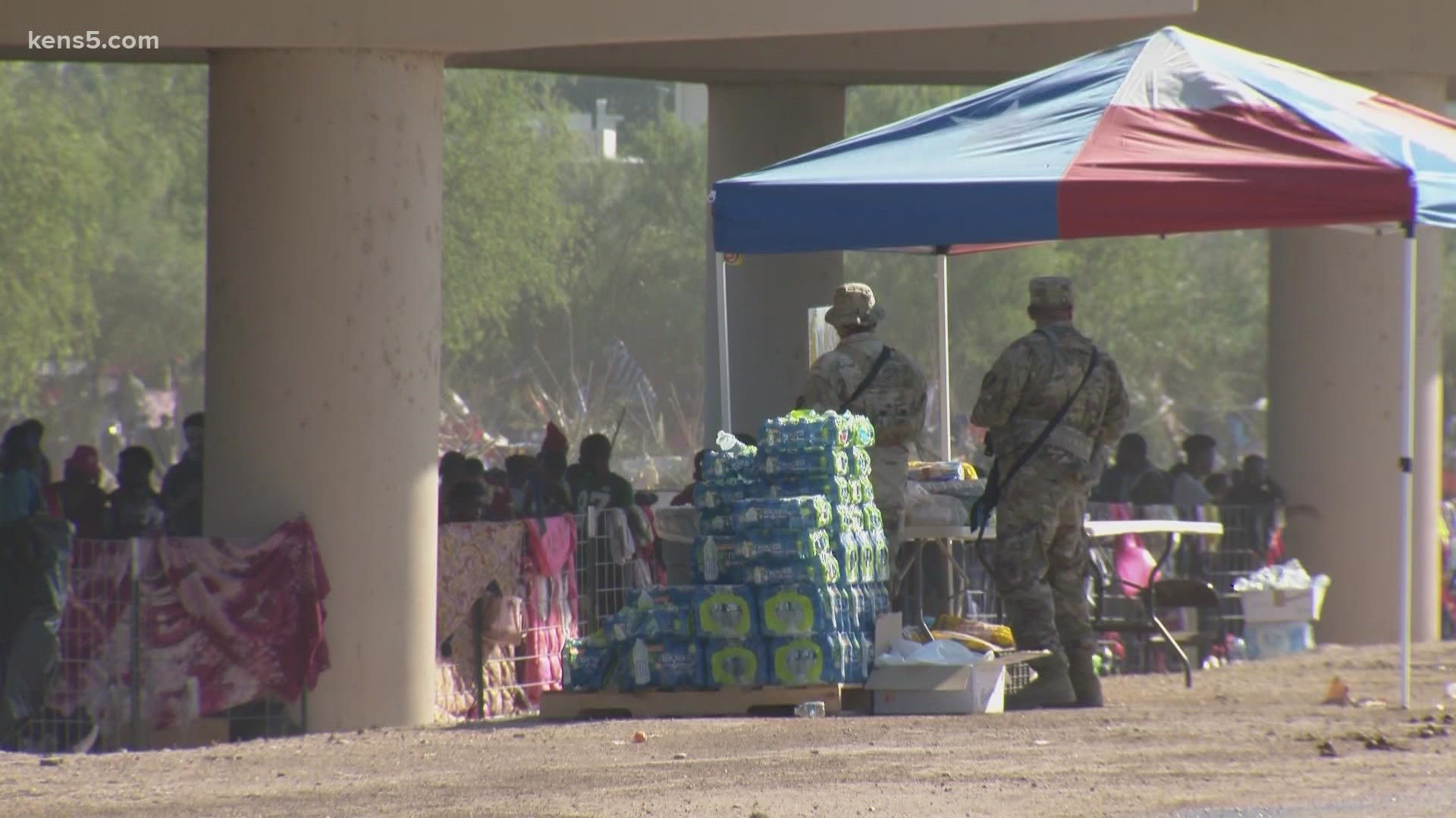 Haitians on Friday crossed the Rio Grande freely and in a steady stream, going back and forth between the U.S. and Mexico through knee-deep water.