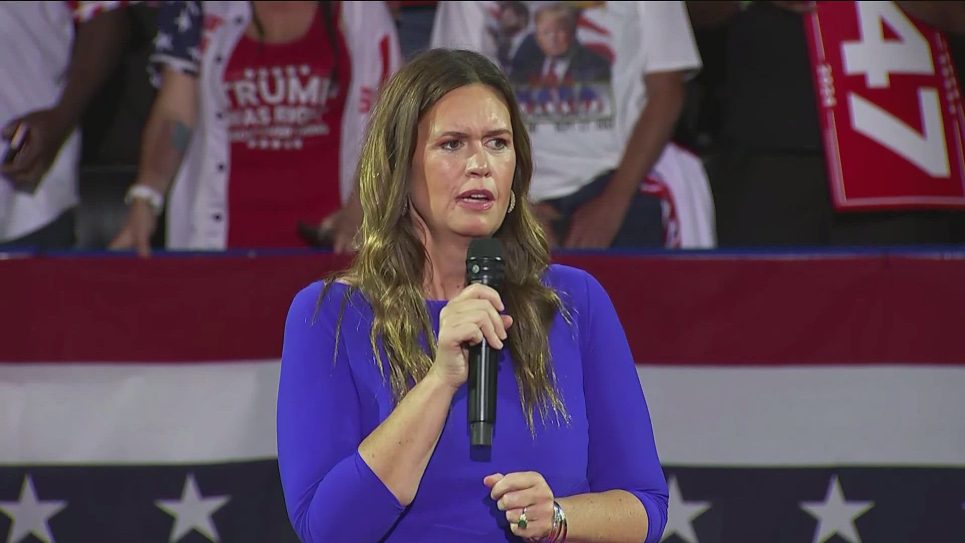 Sanders hosted a town hall featuring candidate Donald Trump in Michigan, where she made comments some interpreted as relating to Harris' lack of biological children.