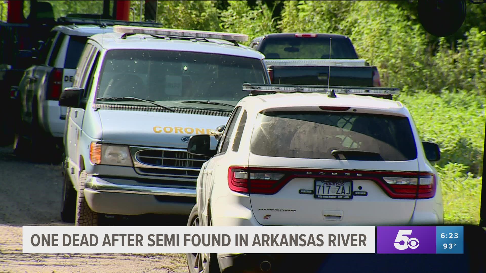 Deputies found the body of a male in a semi-truck that was submerged in the water almost the entire length of the vehicle.