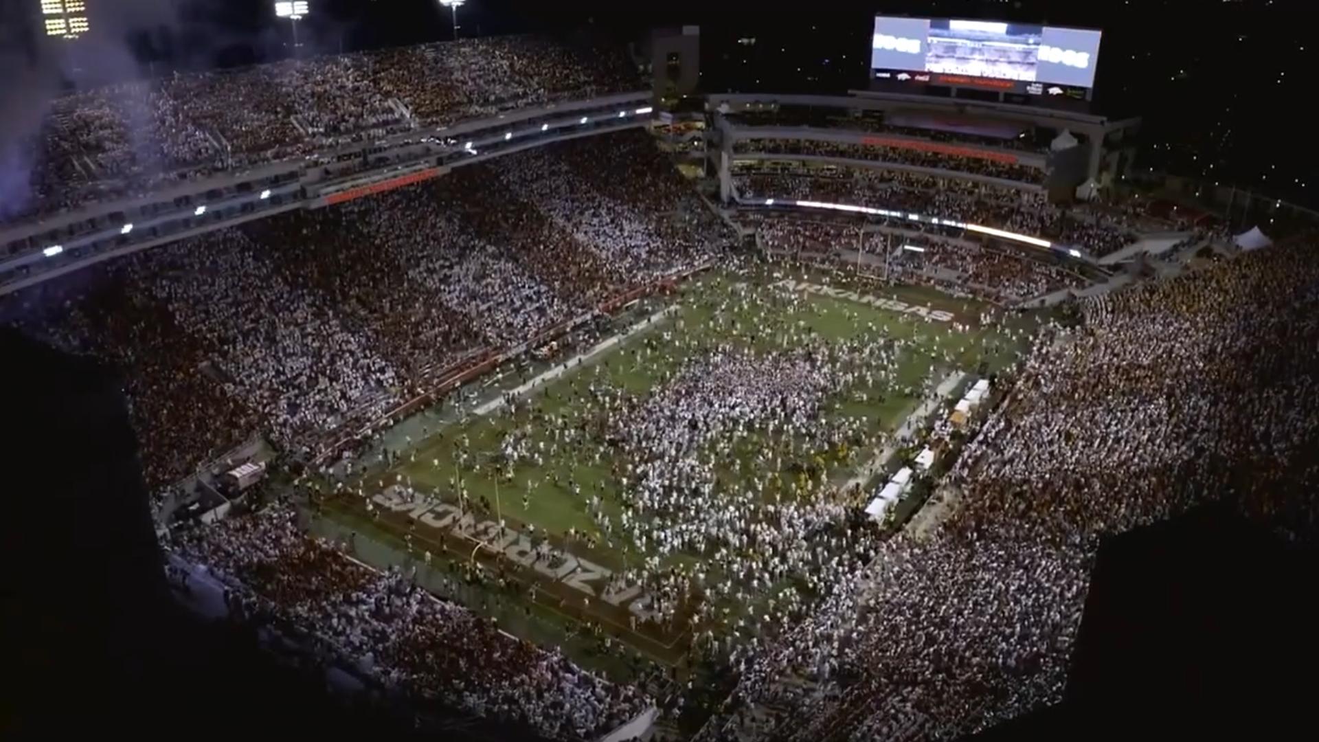 Razorback fans rushed the field after their win against Tennesee on Oct. 5.