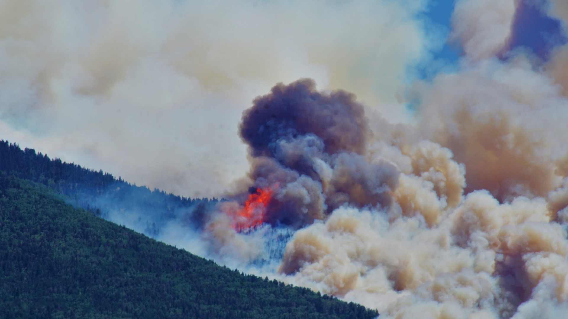 The Pipeline Fire near Flagstaff has burned more than 5,000 acres. Police arrested a man Sunday and charged him with violating the forest's fire ban.