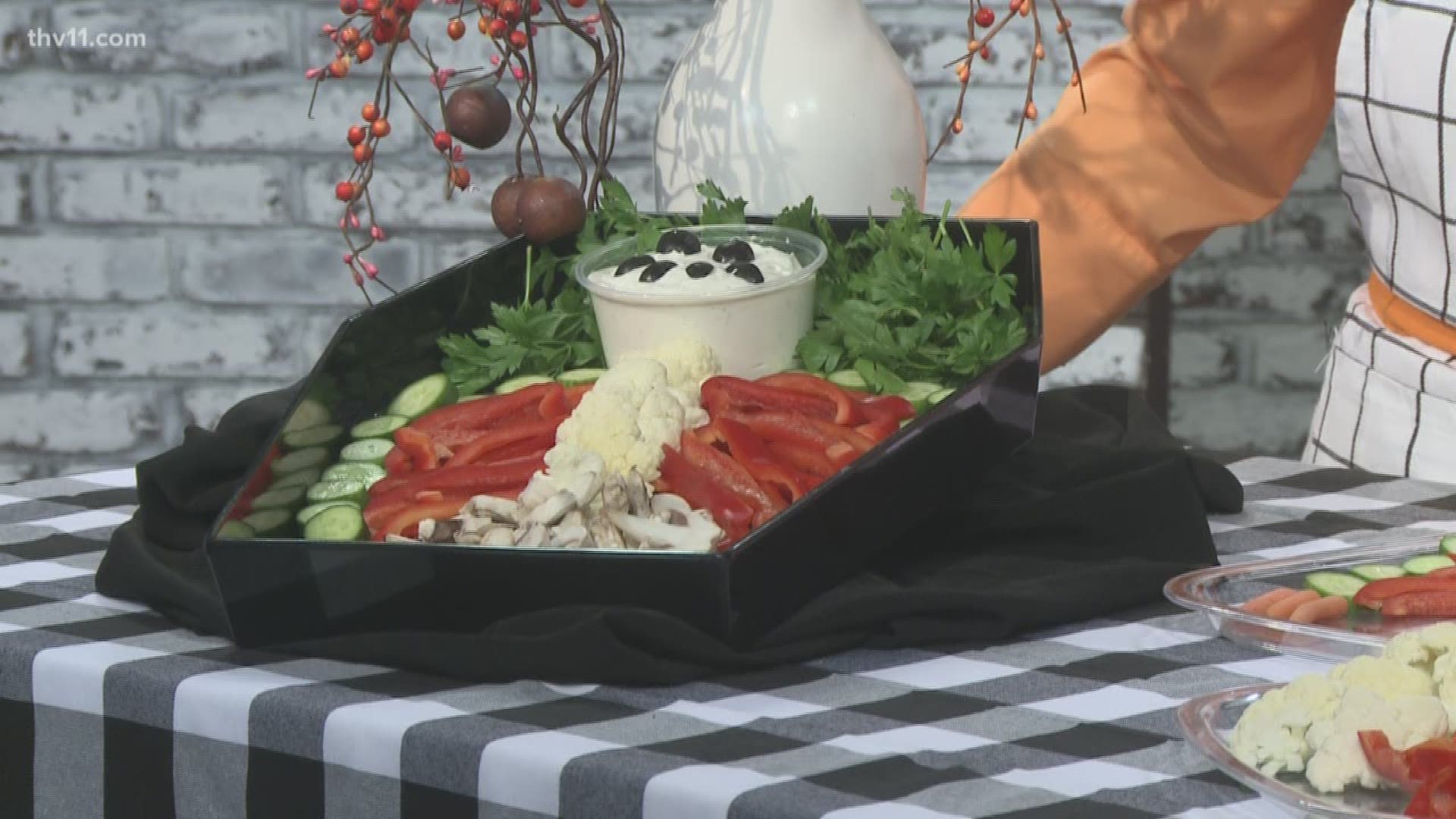 We've got Debbie Arnold here with us this morning and she's making a Halloween treat. We're making skeleton vegetable boards.