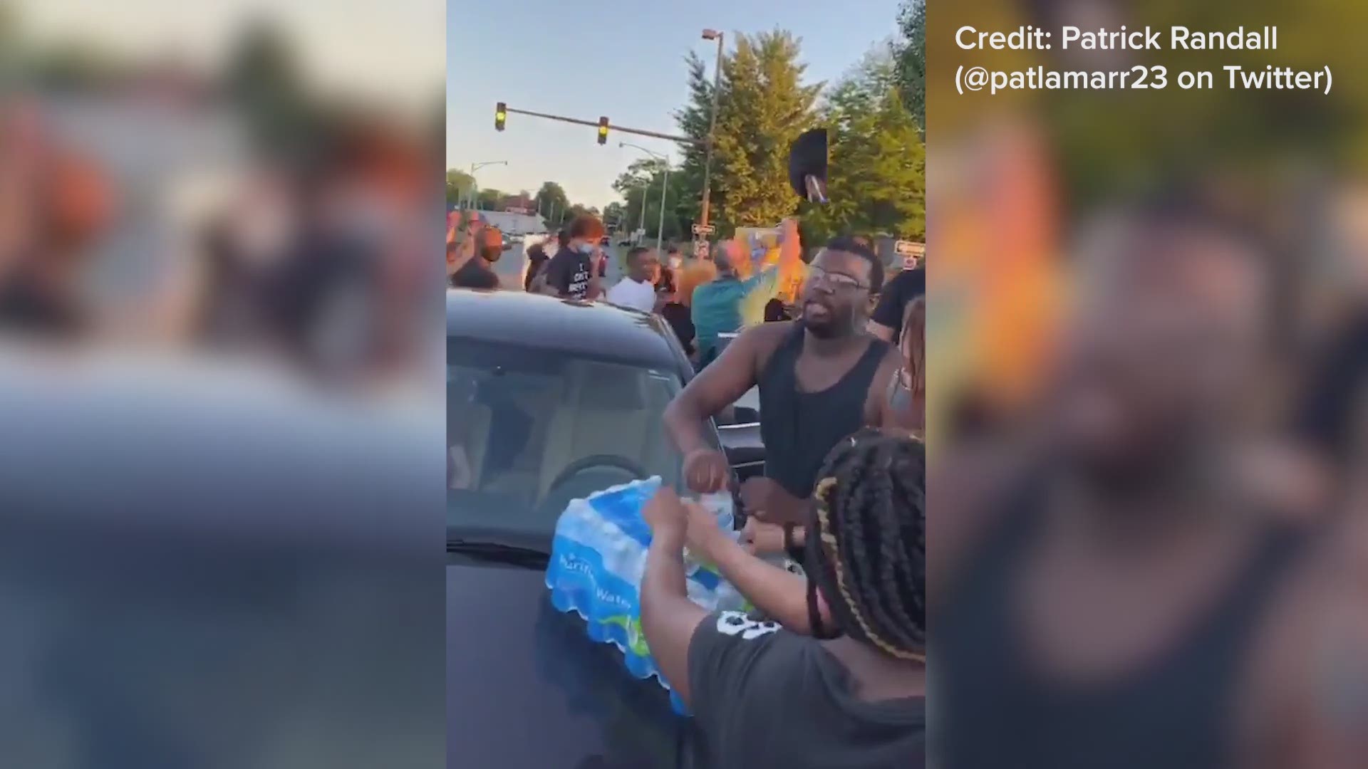 A white couple brought food and water to a group protesting in Little Rock, Arkansas.