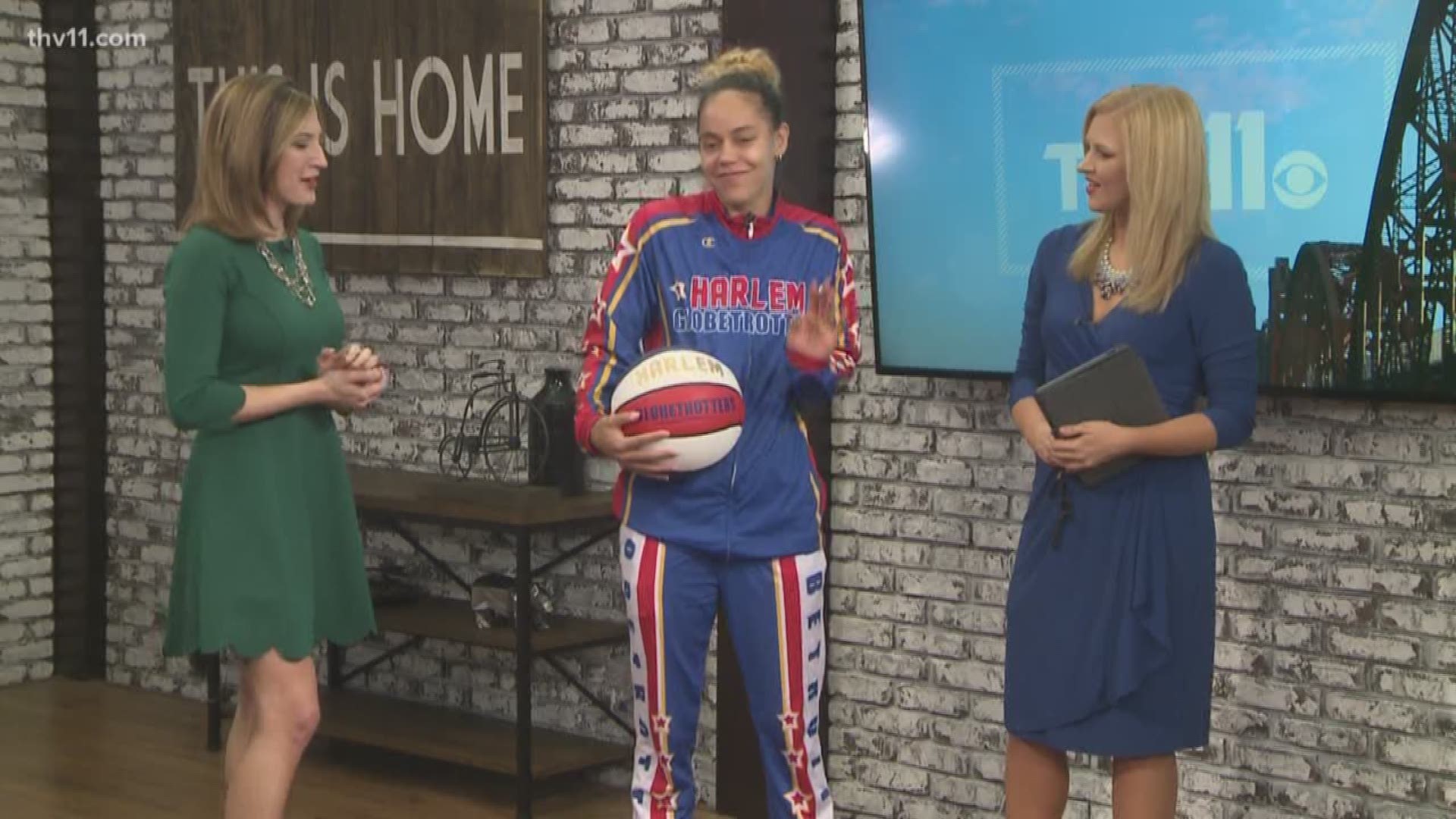 Hoops with the Harlem Globetrotters showed our spelling bee champ some tricks.