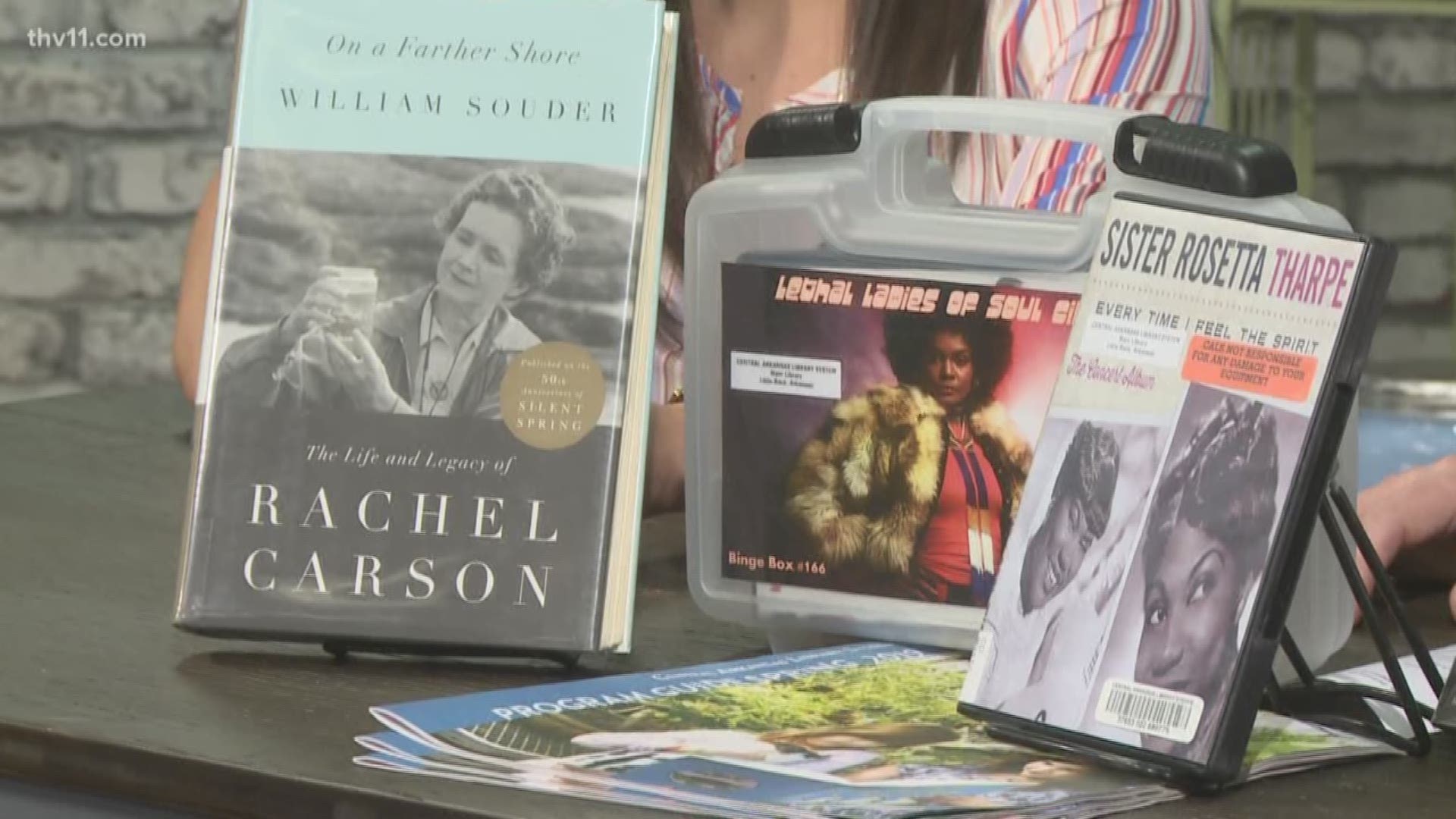 Stewart Fuell with the Central Arkansas Library System shared books, exhibits and DVD's that highlight women in history.