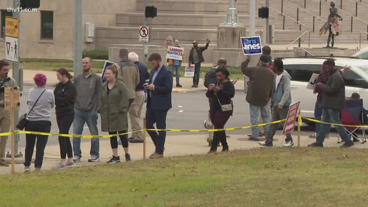 Election workers address long lines at polling locations