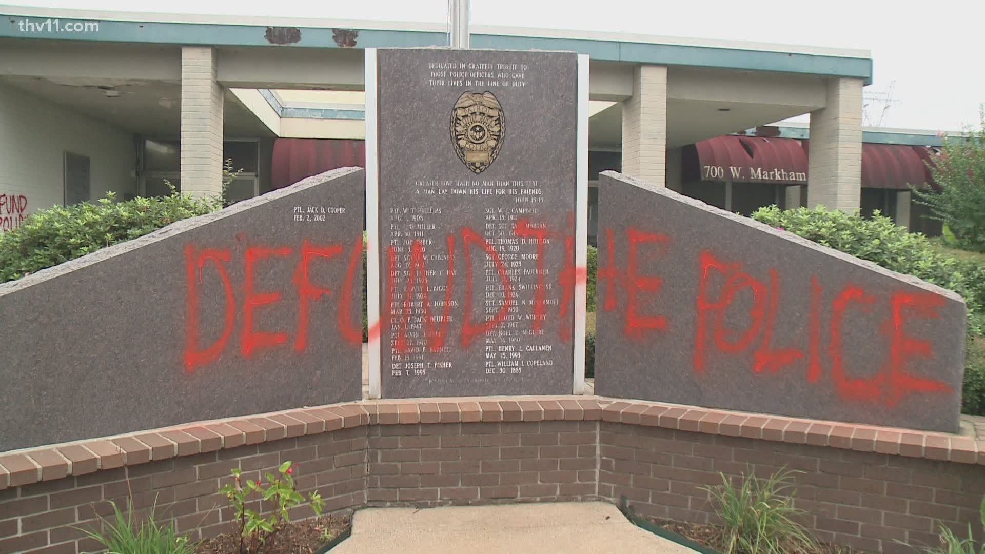 In Little Rock, a monument honoring fallen officers was spray painted, along with several buildings. And just north of the river, a patrol car set on fire.
