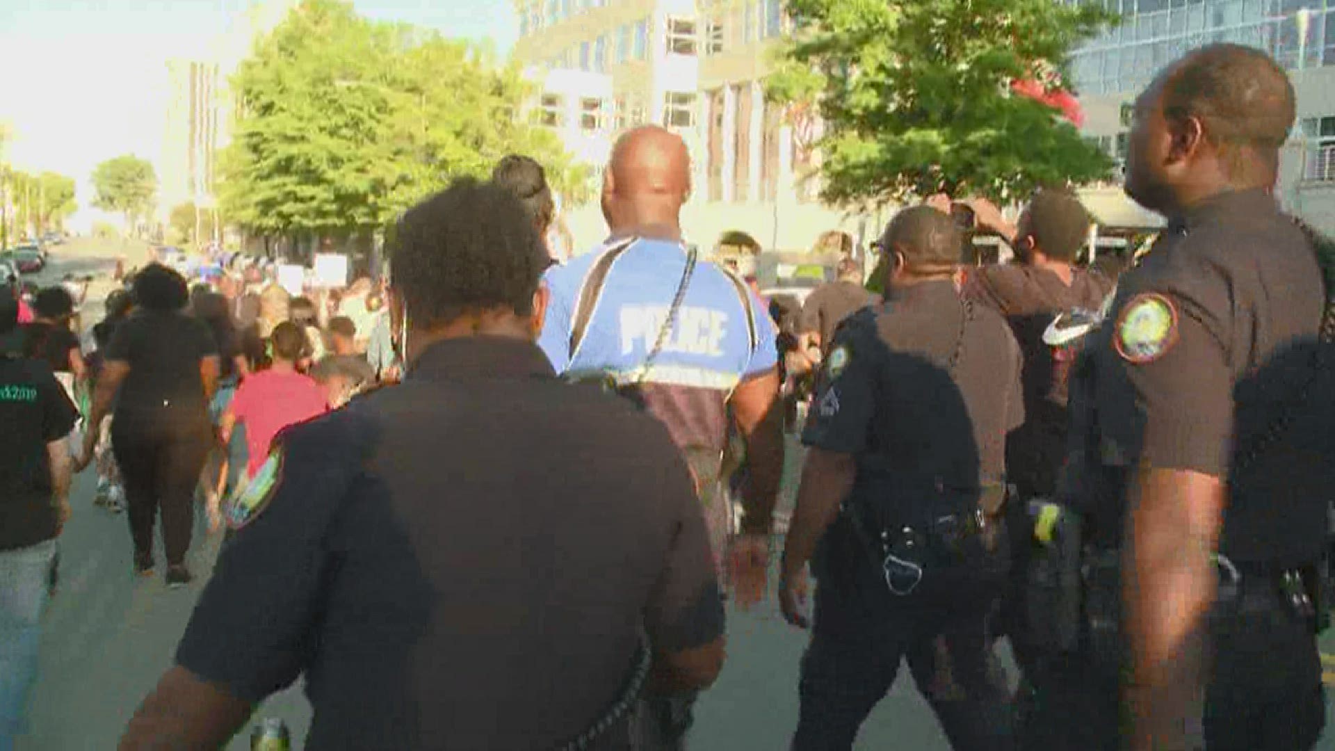Deputies and officers with the Pulaski County Sheriff's Office and the Little Rock Police Department joined protesters for the first time Wednesday.