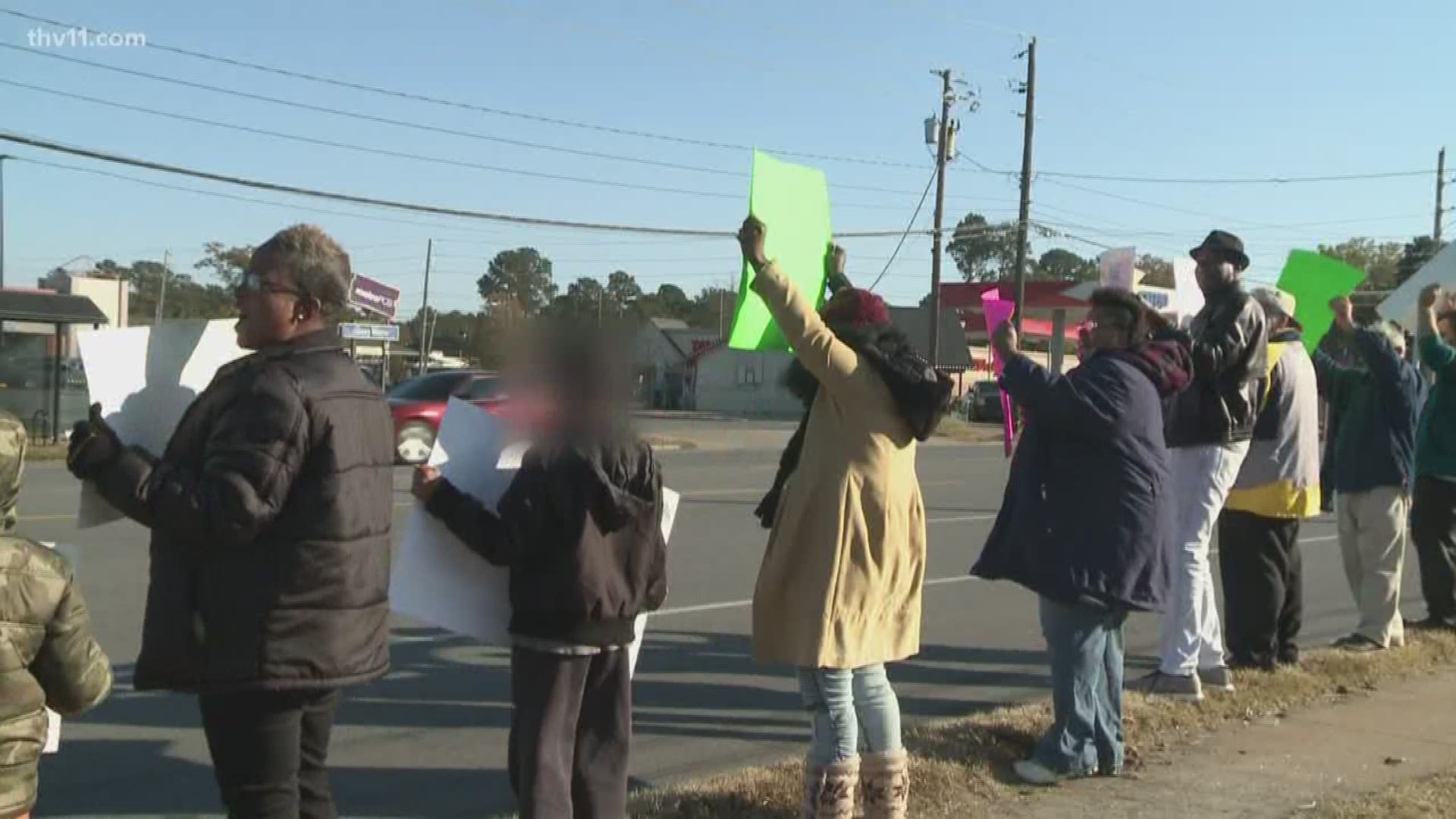 Parents hit the streets of Little Rock voicing their opinions to protest the closings of schools.