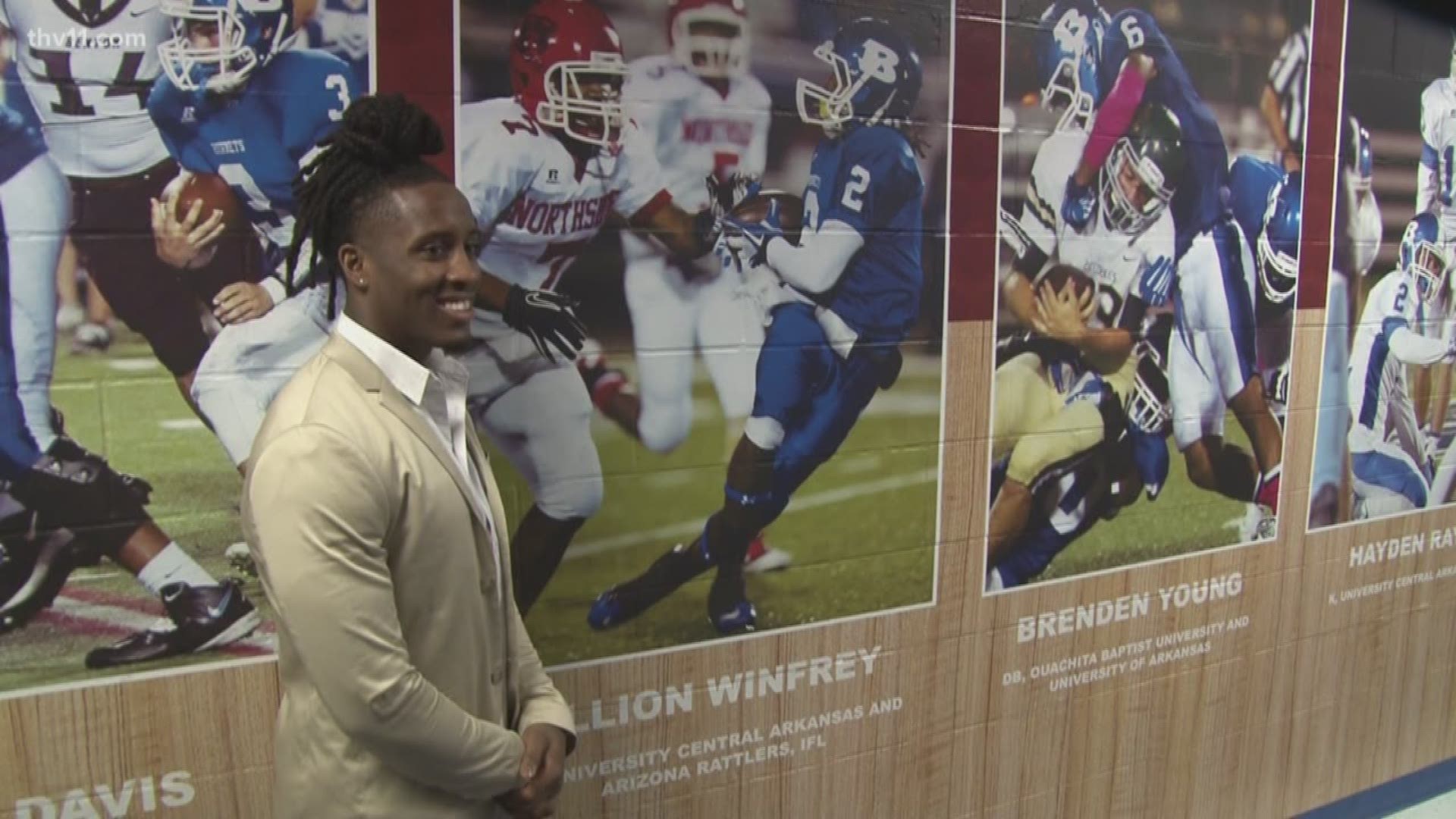 Bryant unveils new indoor graphics wall featuring former players