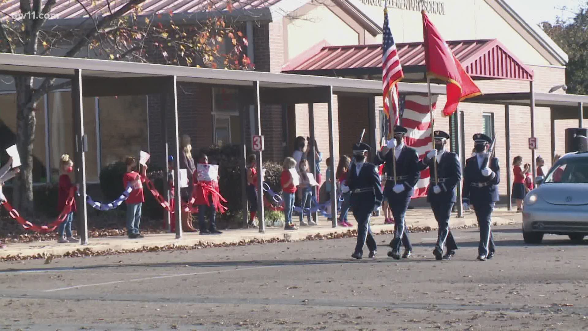 Cabot students held signs, waved, cheered - many even dressed in red, white, and blue - as veterans from the community drove by.