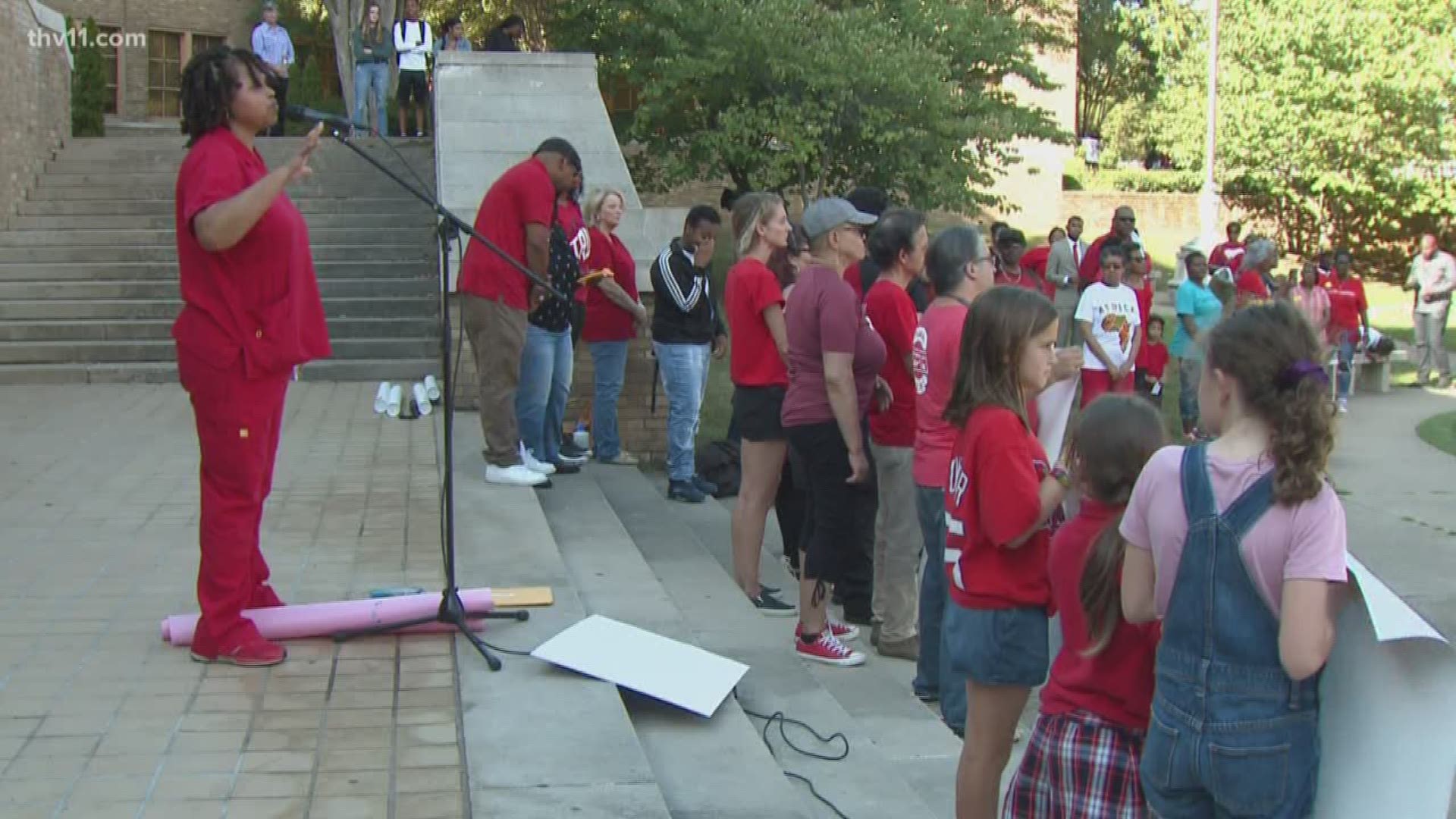 Six decades after the Little Rock Nine walked into Central High School, dozens line up to protest the state's decision to partially hand over local control.