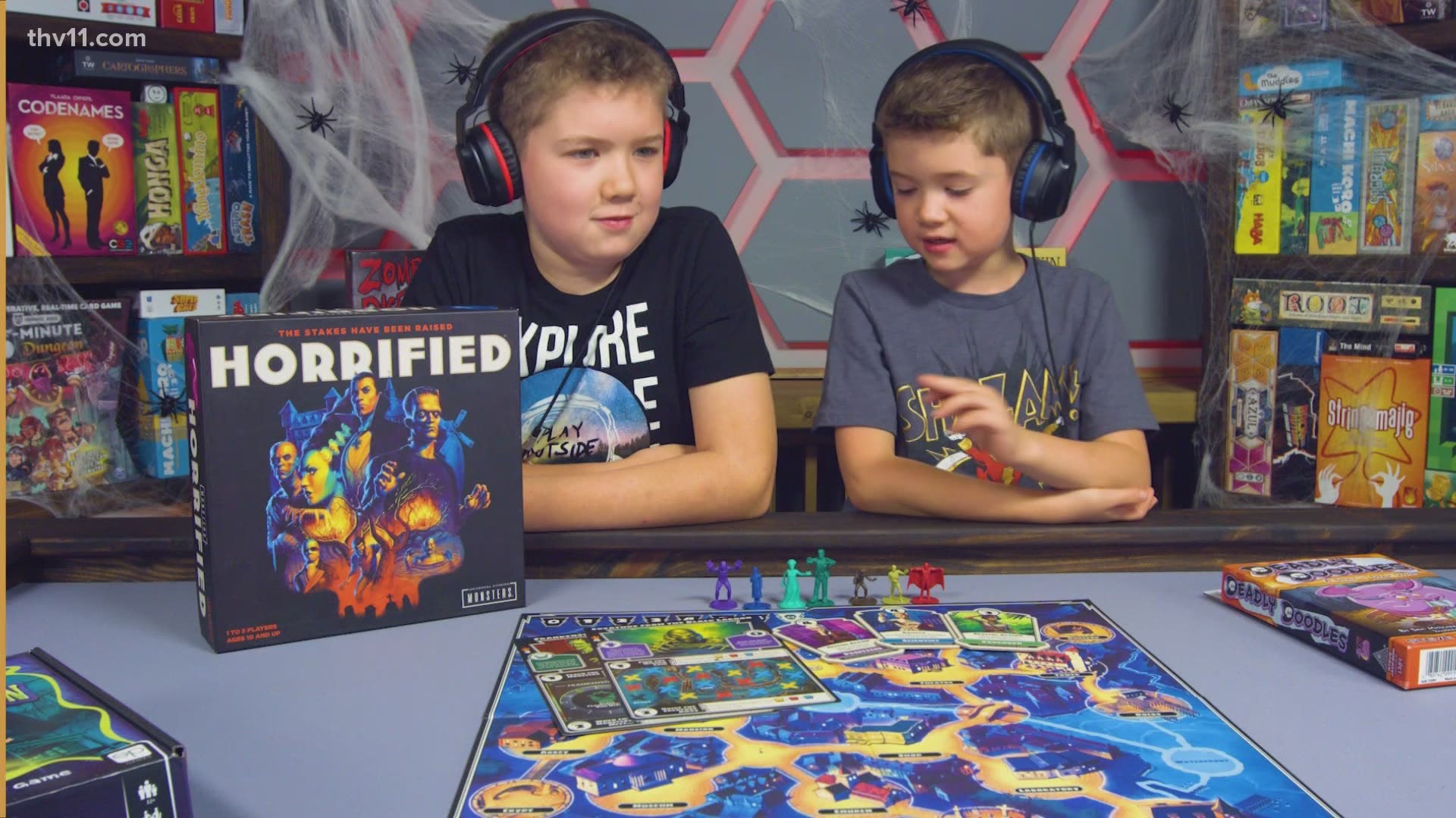 Jarred and Peyton with YouTube channel 'Kidsplaining' talk us through some of their favorite “spooky” board games including Horrified, Deadly Doodles and more.