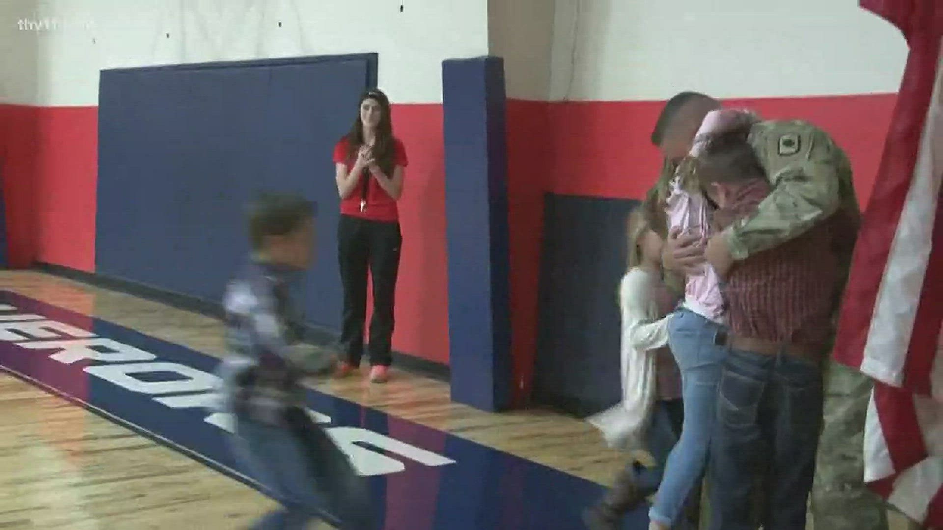 A father of four who was deployed for nearly a year in Africa came home and surprised his kids at a basketball game.