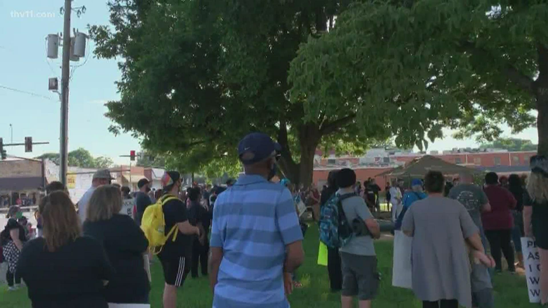 People gather in downtown Benton to begin a peaceful protest.