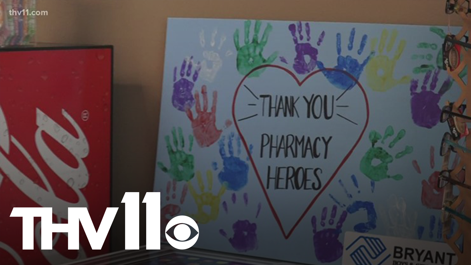A Bryant pharmacist got emotional when a group of kids made “thank you” signs for him and his staff. His days have been a lot busier during the pandemic.