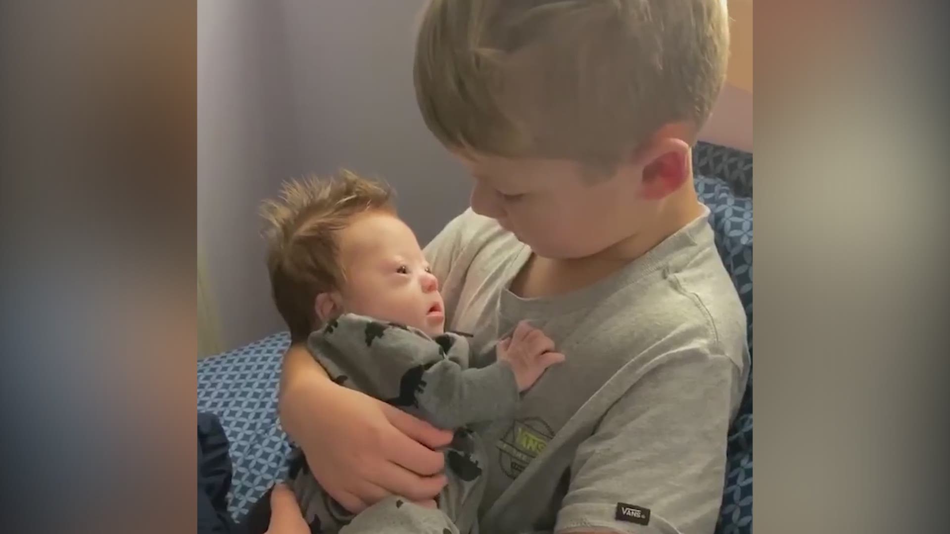 Nicole Powell, from Cabot, Arkansas, shared this video on her social media about one of her sons singing to his youngest child who has Down Syndrome.