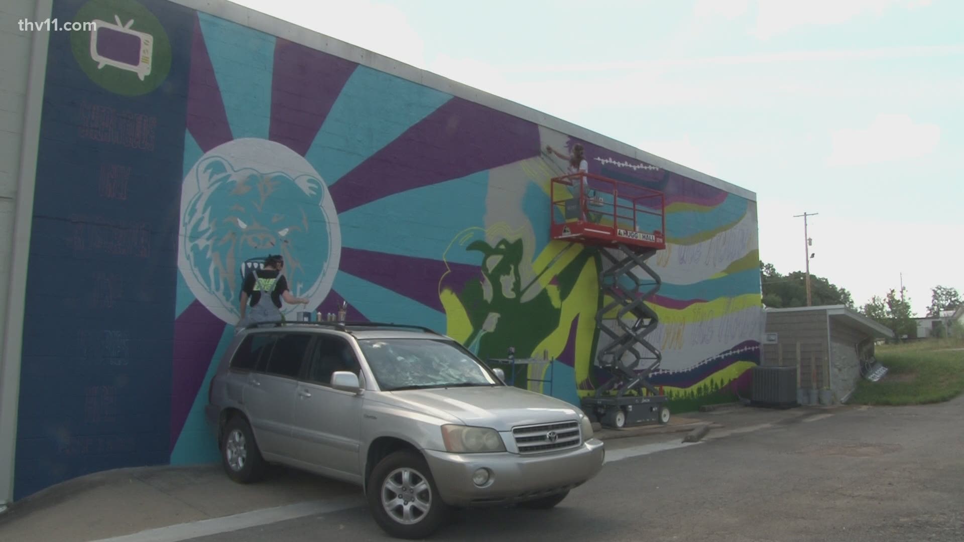 One artist in Conway is using her gift to help brighten another central Arkansas city.