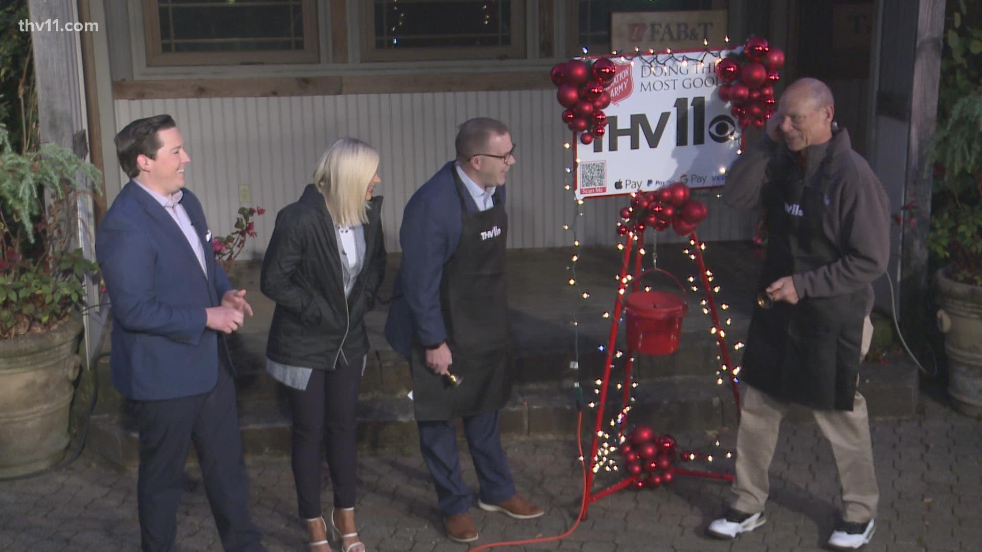 Longtime THV11 evening anchor Craig O'Neill surprises Meteorologist Skot Covert with the first-ever THV11 Traveling Kettle.