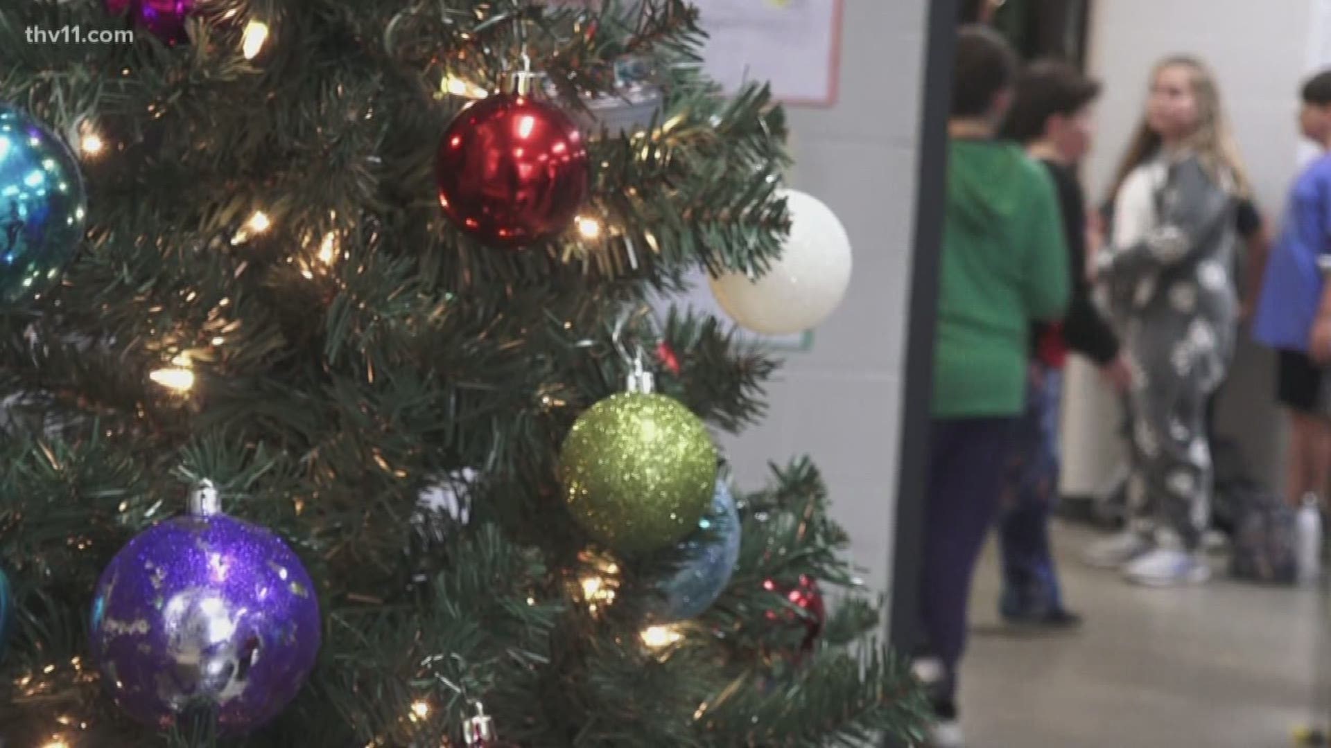 Students at Bauxite's Pine Haven Elementary have raised money so their classmates in need will have a Christmas tree this year.