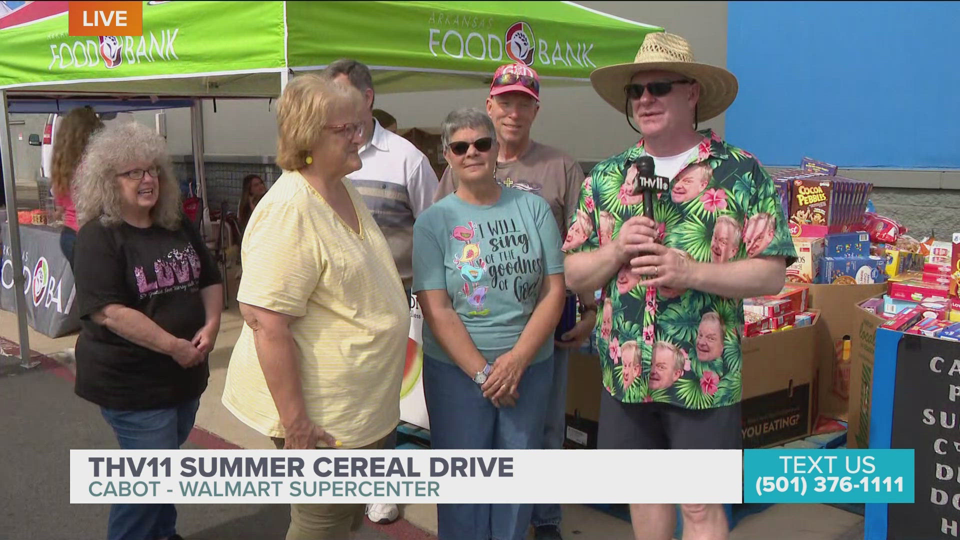 Quail and Manna team donates money and cereal boxes to THV11 Summer Cereal Drive.