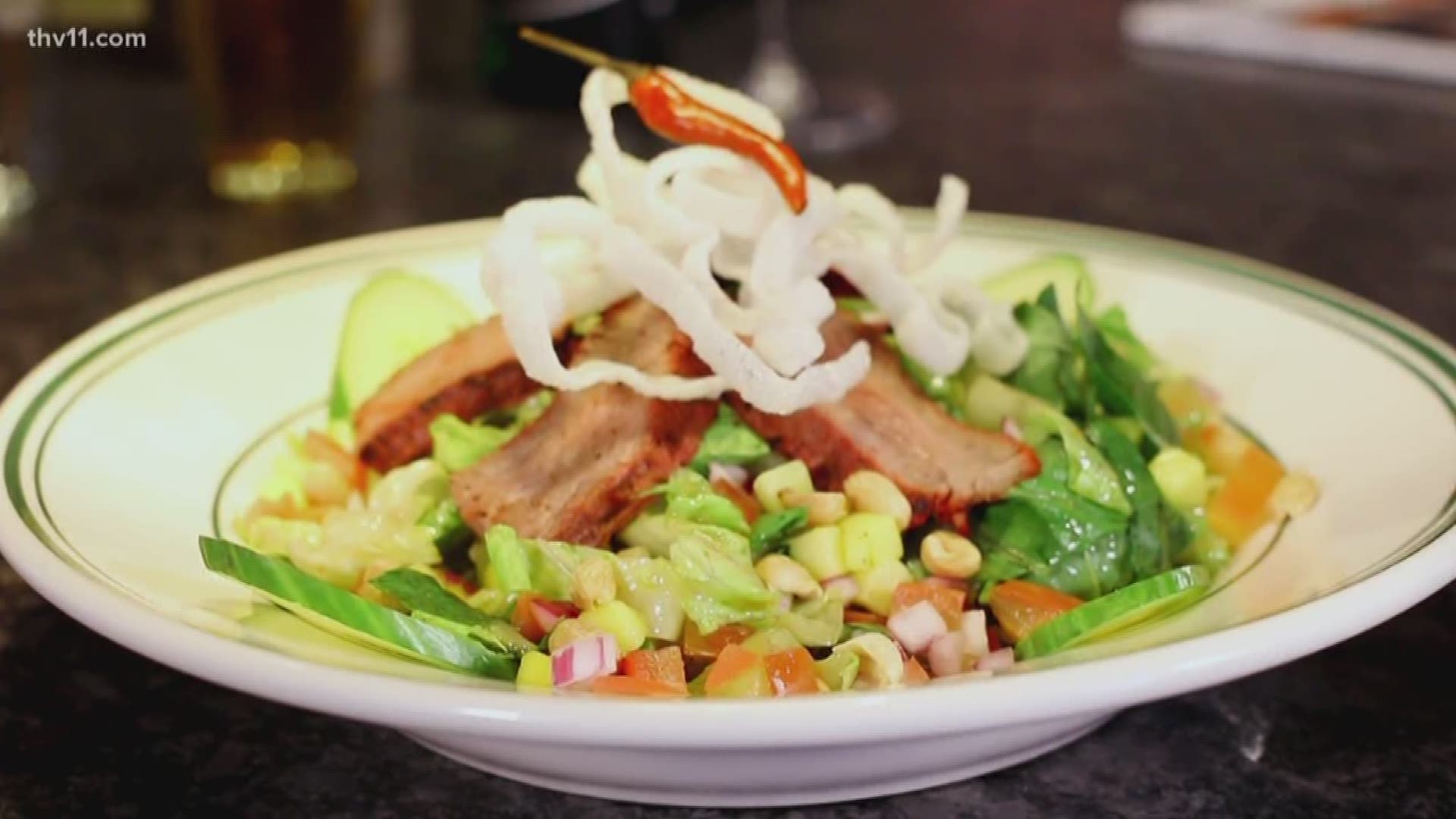 Atlas Bar is serving up great food and drinks including a delicious Thai Beef Salad!