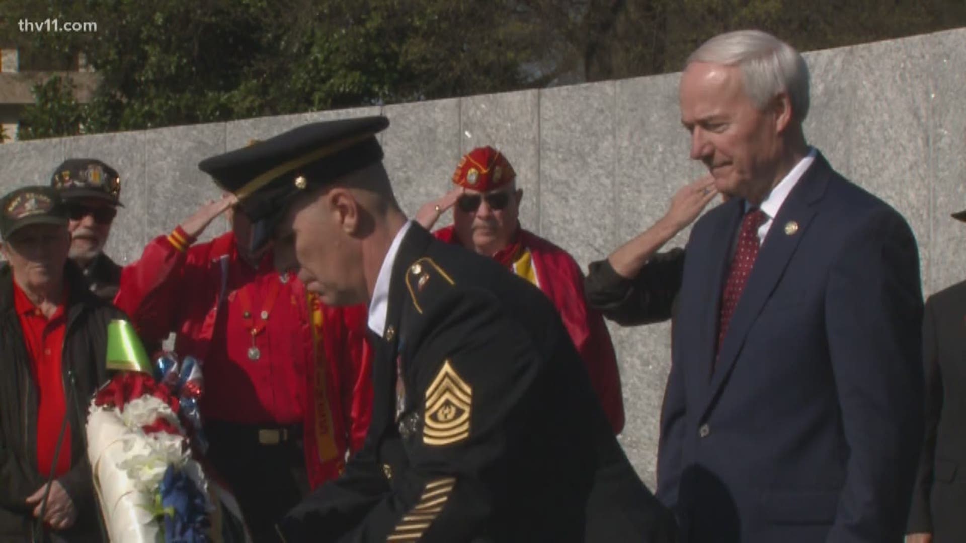 Governor Asa Hutchinson honors Arkansans who gave their lives in the Vietnam War by laying a wreath at the Vietnam Veterans Memorial.