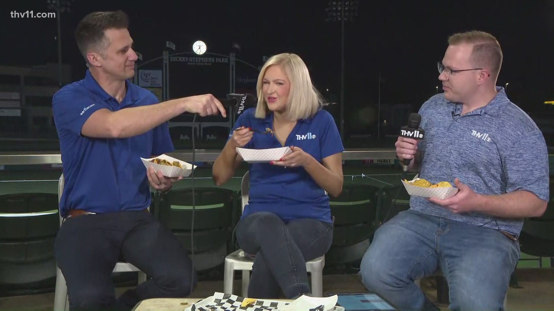 Amanda, Rob, and Skot try out the barbecue nachos at Dickey Stephens Park ahead of the Arkansas Travelers game.