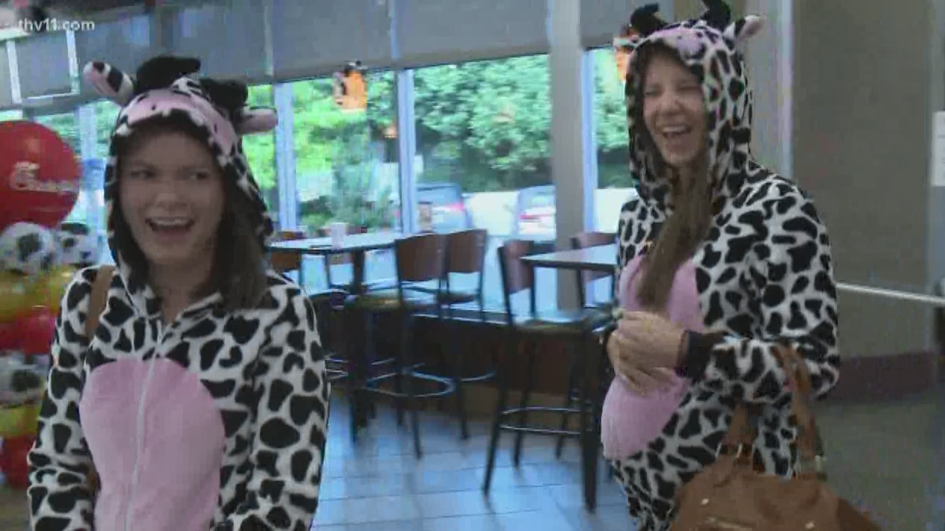 Two Chick-Fil-A fans dressed as cows to get some free food from Chick-Fil-A on Cow Appreciation Day. But you only need to wear some cow-themed apparel to get in on the deal.