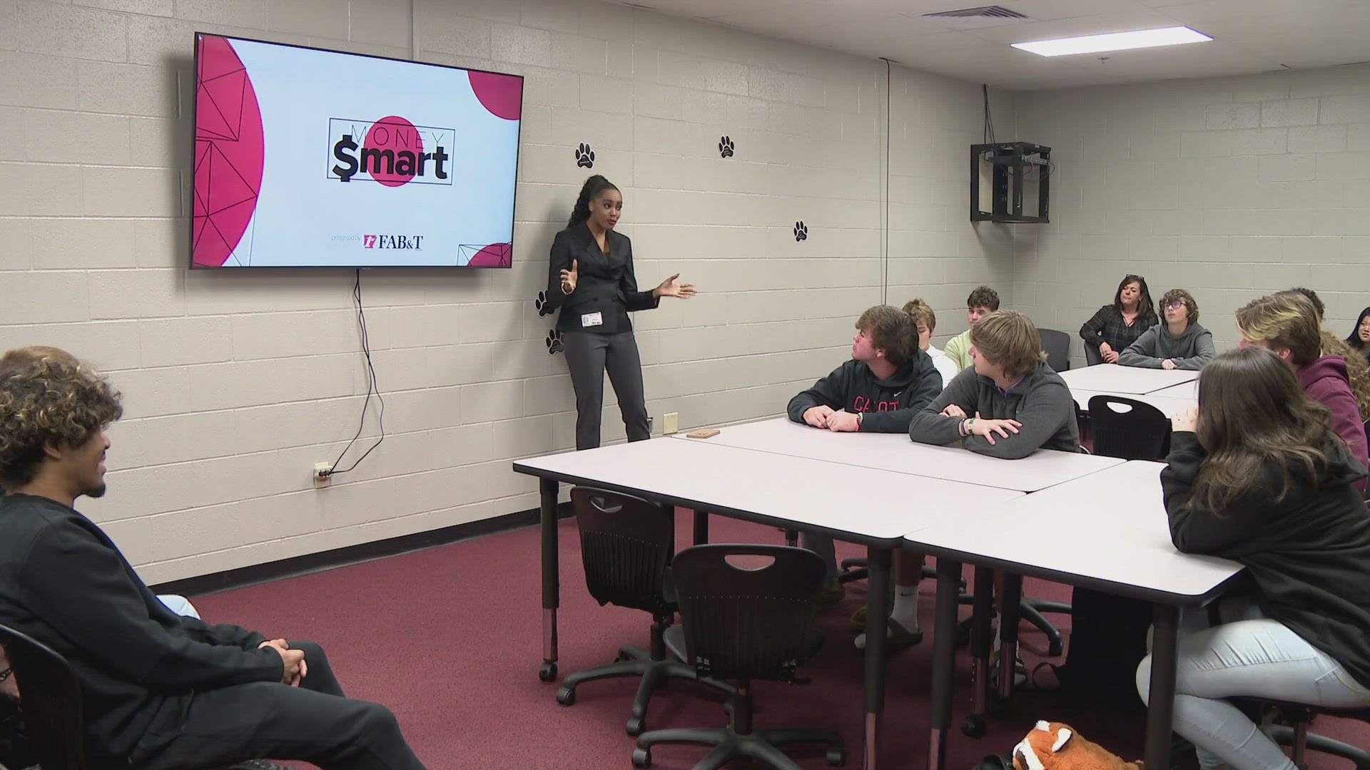 Faith Woodard brought the Money Smart Program to Cabot High School, where students learned about budgeting, credit scores and interest rates.