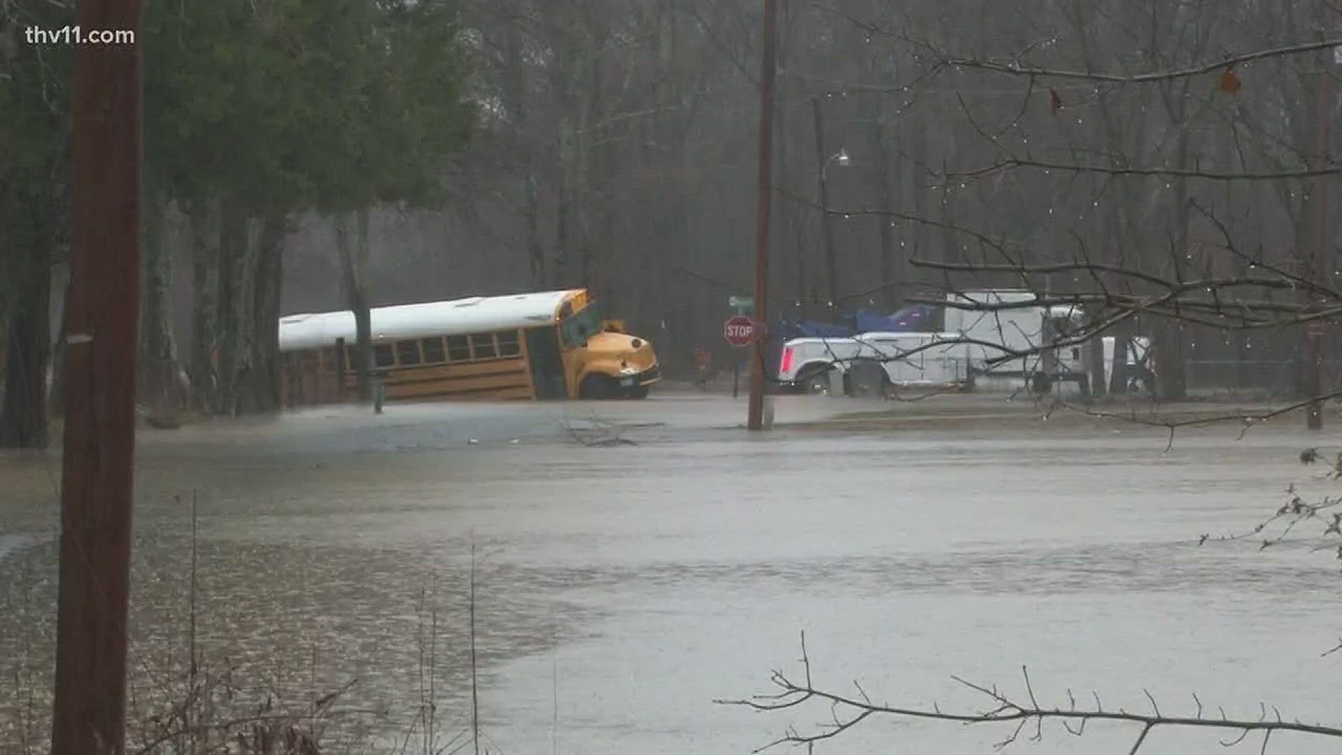 A Pulaski County Special School District bus got stuck after the driver attempted to drive through flooded waters.