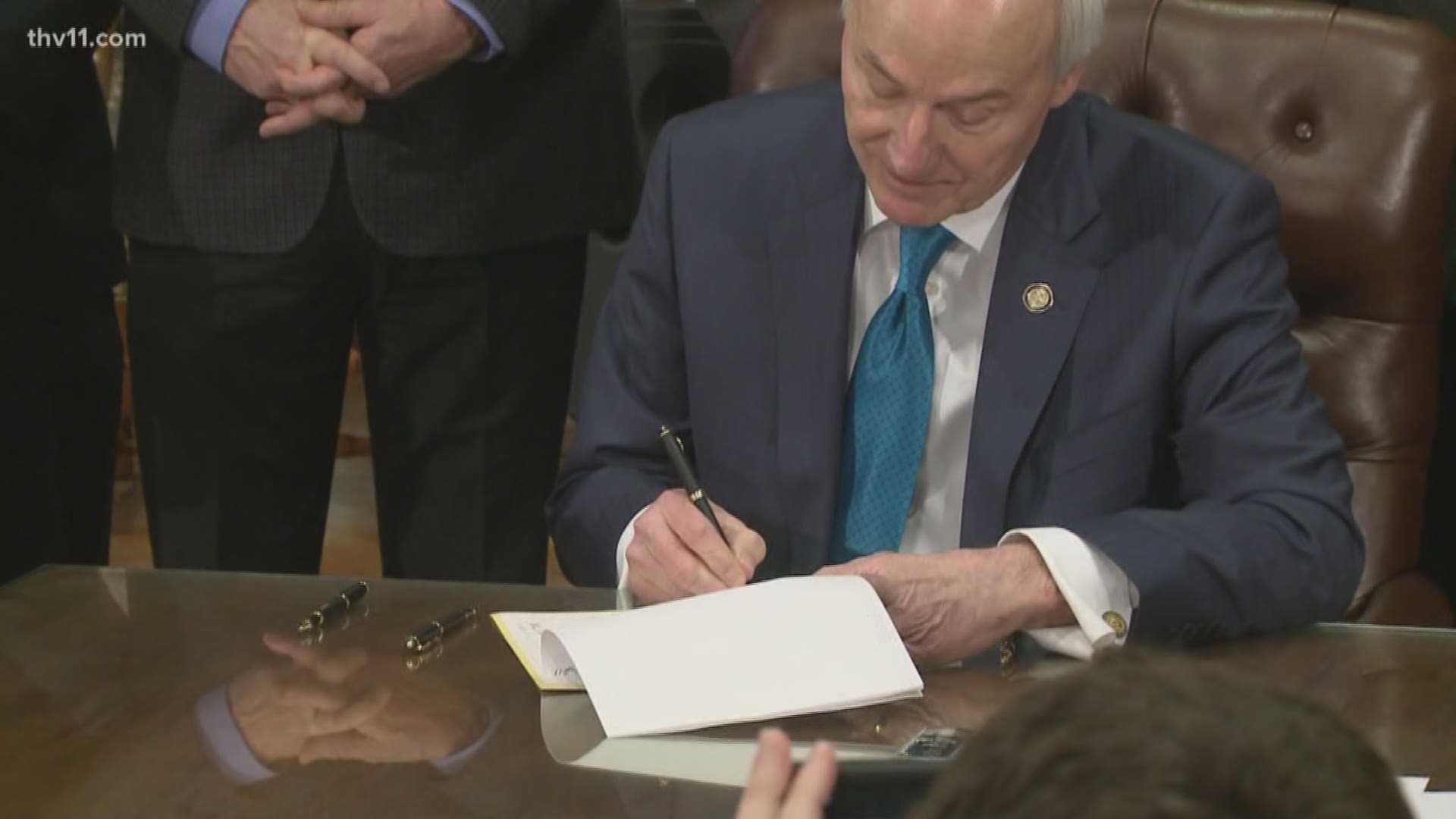 Gov. Asa Hutchinson signed his $97 million dollar tax plan into law today, which will impose tax cuts to the state's top earners over the next two years.