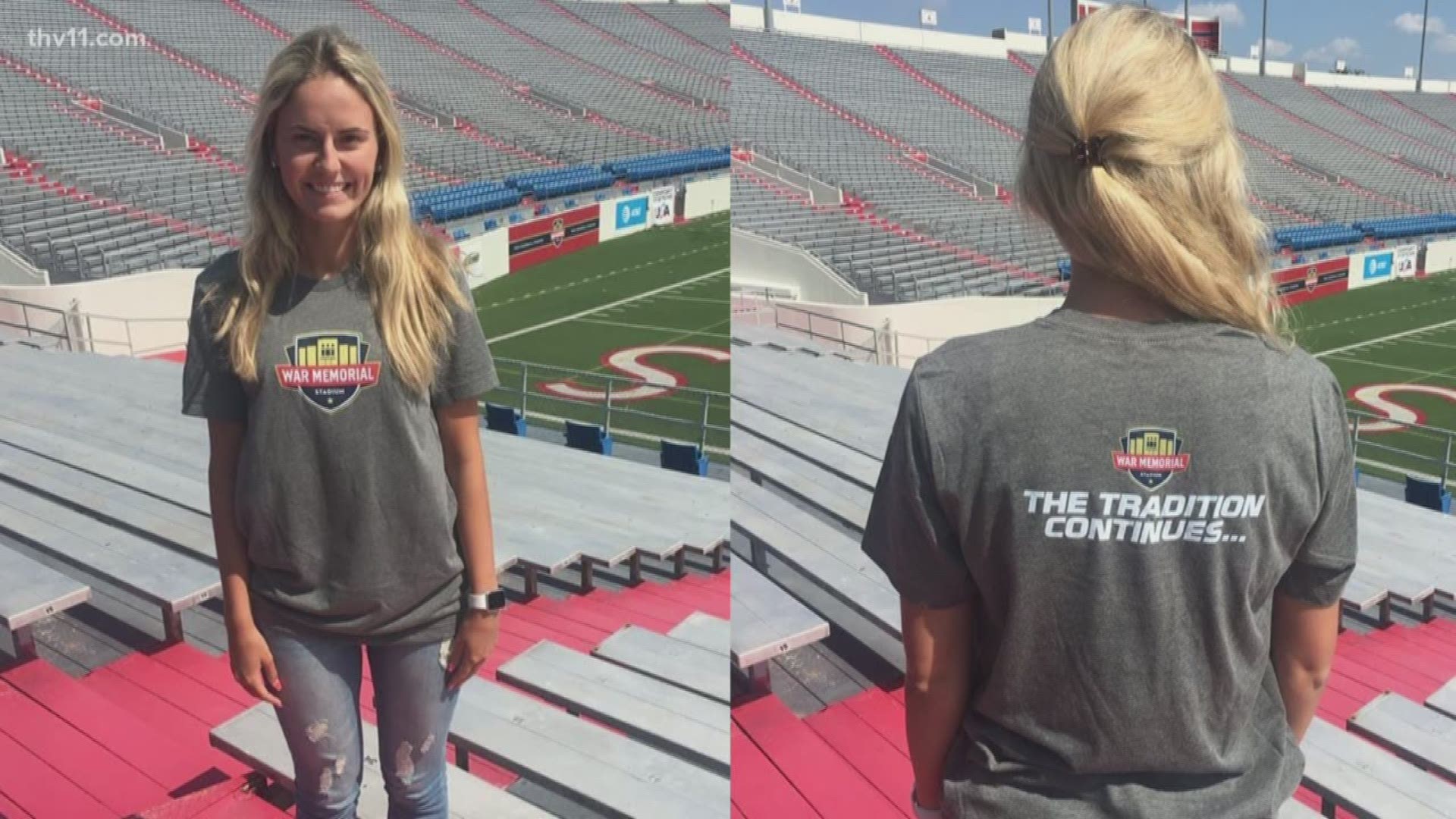The shirt says 'War Memorial Stadium' on the front and 'The Tradition continues' on the back.
