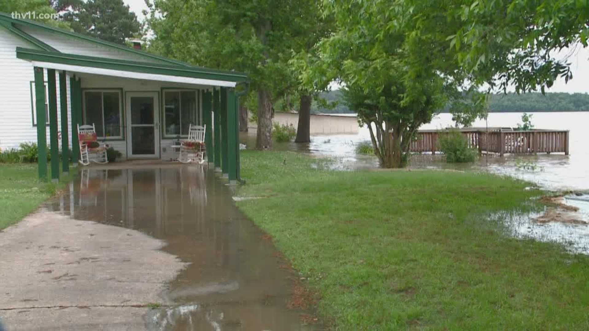 Currently, there is no water inside this woman's home, but within the next few days, that could be a completely different story as the water creeps closer to land here at lake Conway."