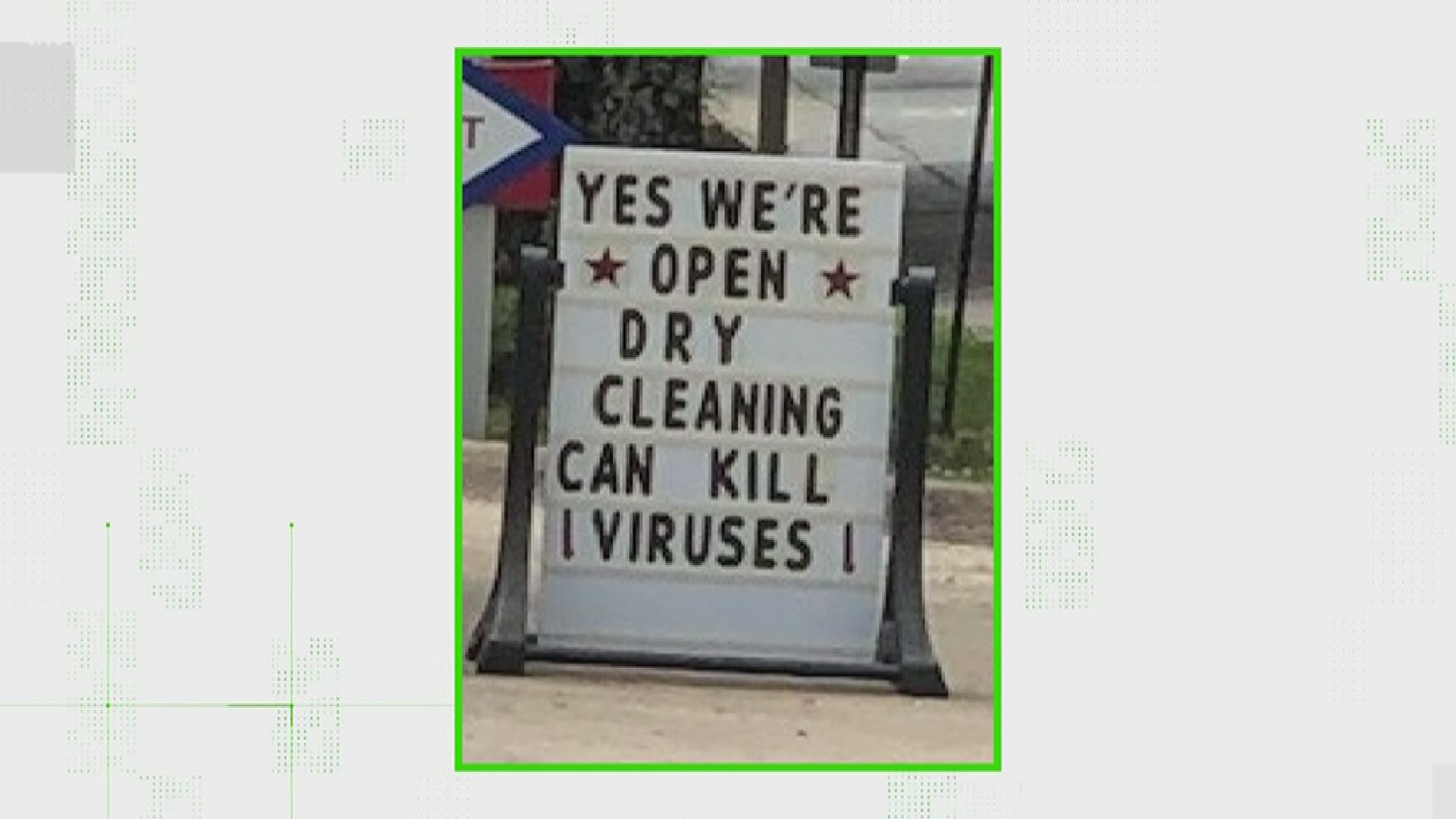 A sign sitting in front of a Little Rock dry cleaners reads, “YES WE’RE OPEN. DRY CLEANING CAN KILL VIRUSES.”