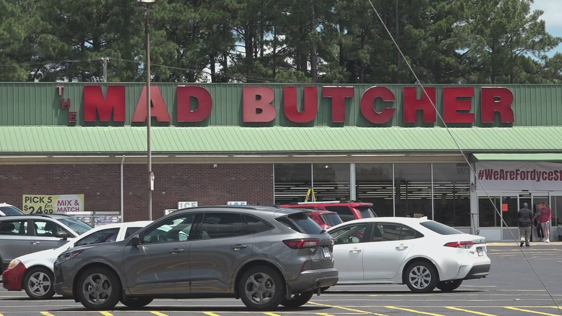 The Mad Butcher grocery store will re-open for the first time since last month's mass shooting. Here's what the community has to say.