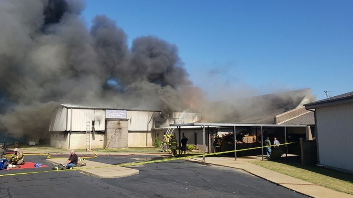 Multiple agencies on scene of large structure fire at Searcy Faith