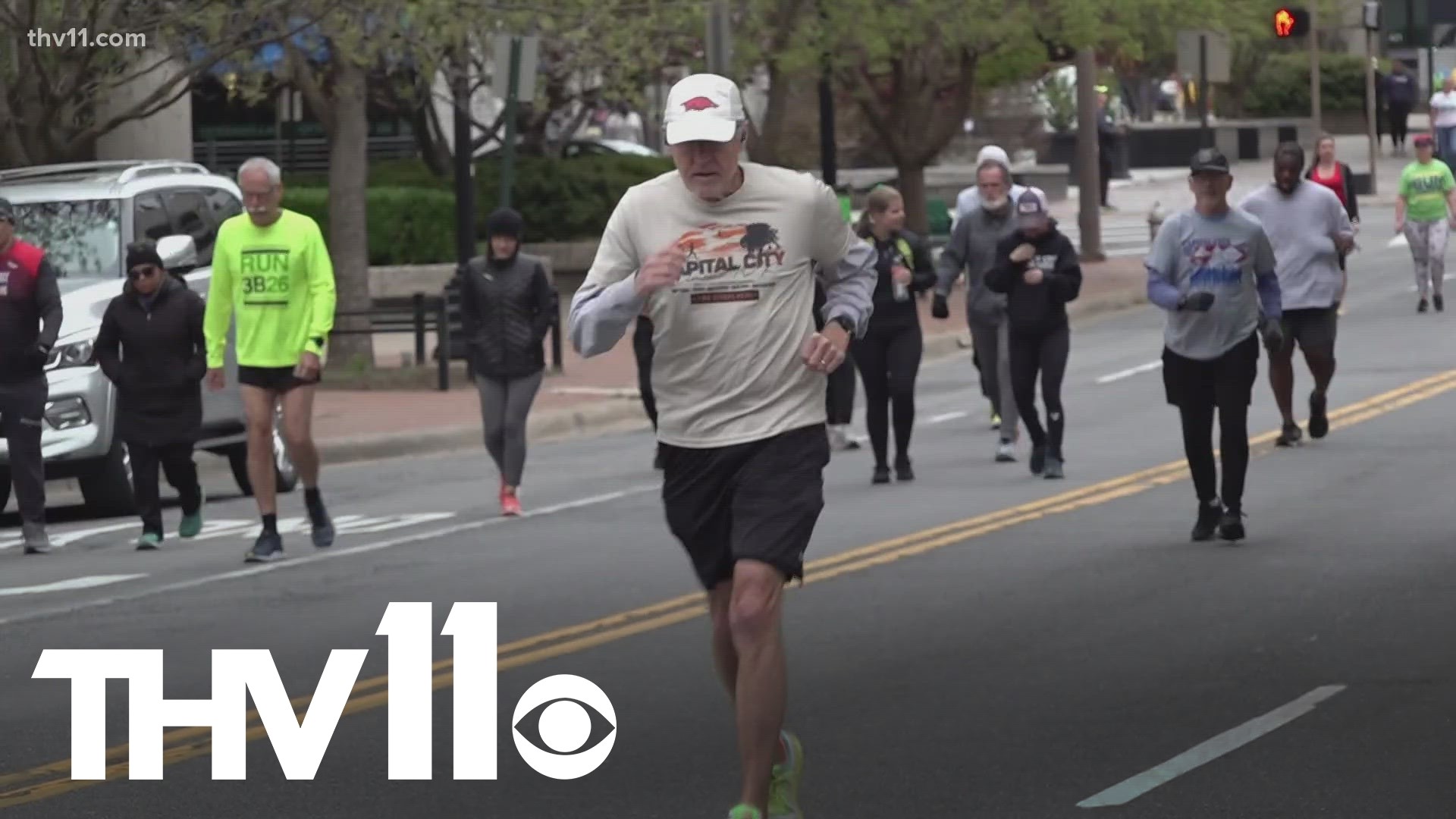 About 500 runners ran down Capitol Avenue on Saturday for a fundraiser to help rebuild Rock City Running, which was destroyed in the tornado on March 31.