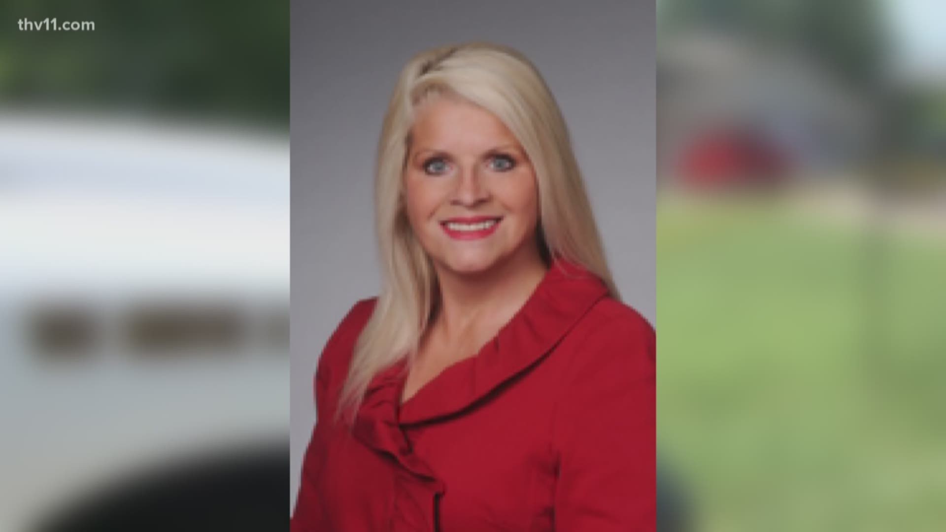 A woman is in police custody tonight in connection with the death of a former state senator.