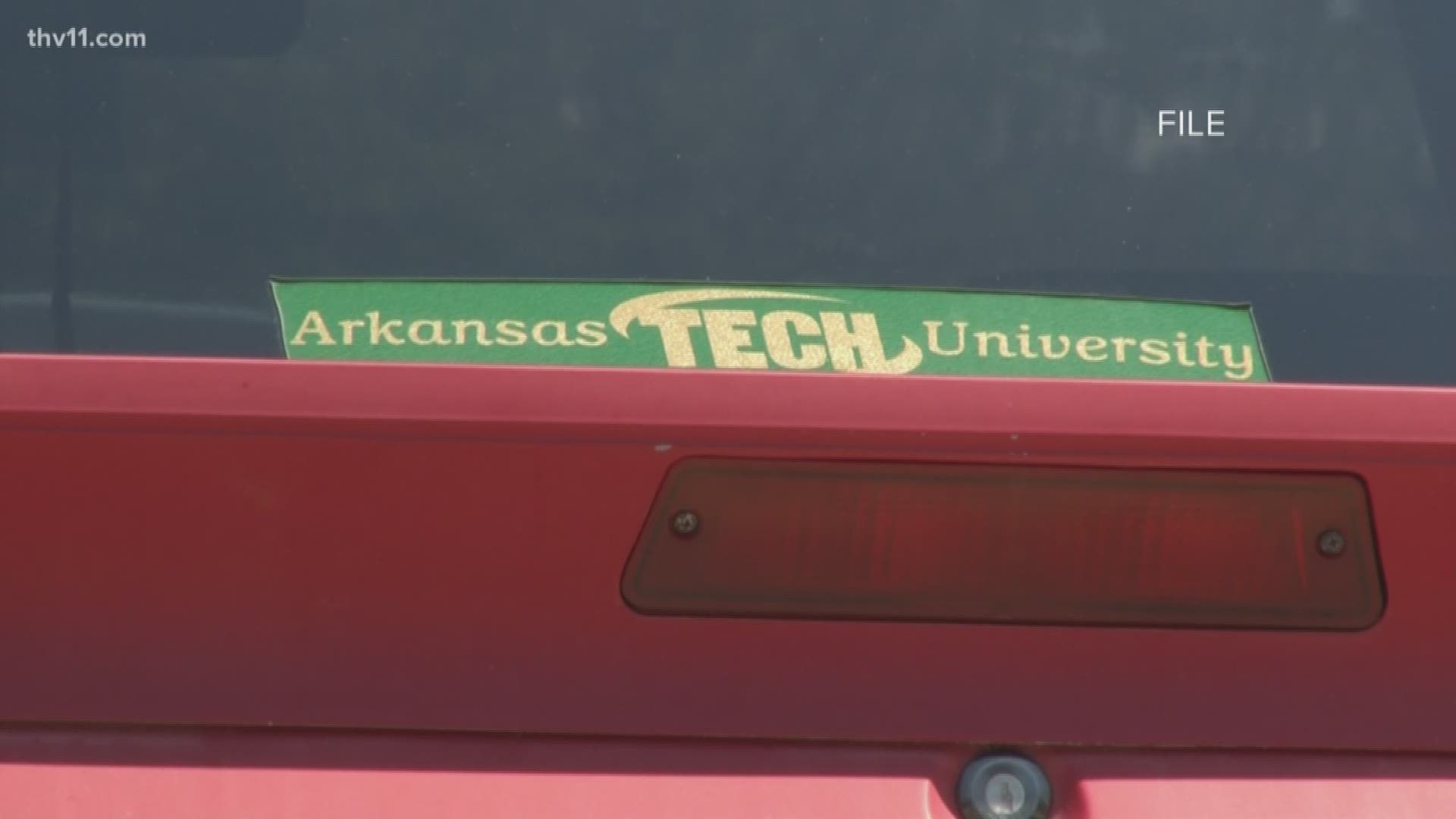 A man was shot by police outside his apartment near Arkansas Tech.