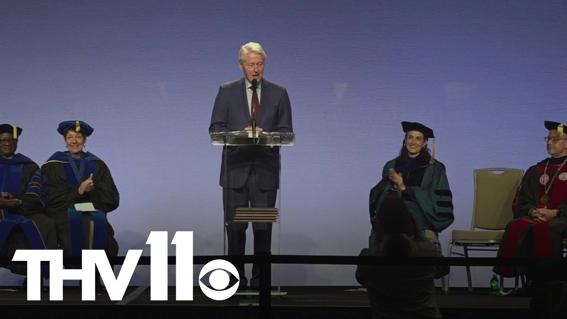 Nearly 60 students received their graduate degrees from the Clinton School of Service on Saturday, with Bill Clinton sharing remarks during the ceremony.