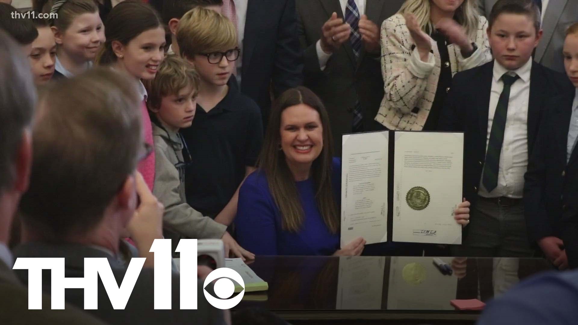 After passing in the Senate yesterday, Gov. Sarah Huckabee Sanders officially signed the Arkansas LEARNS Bill into law on Wednesday.