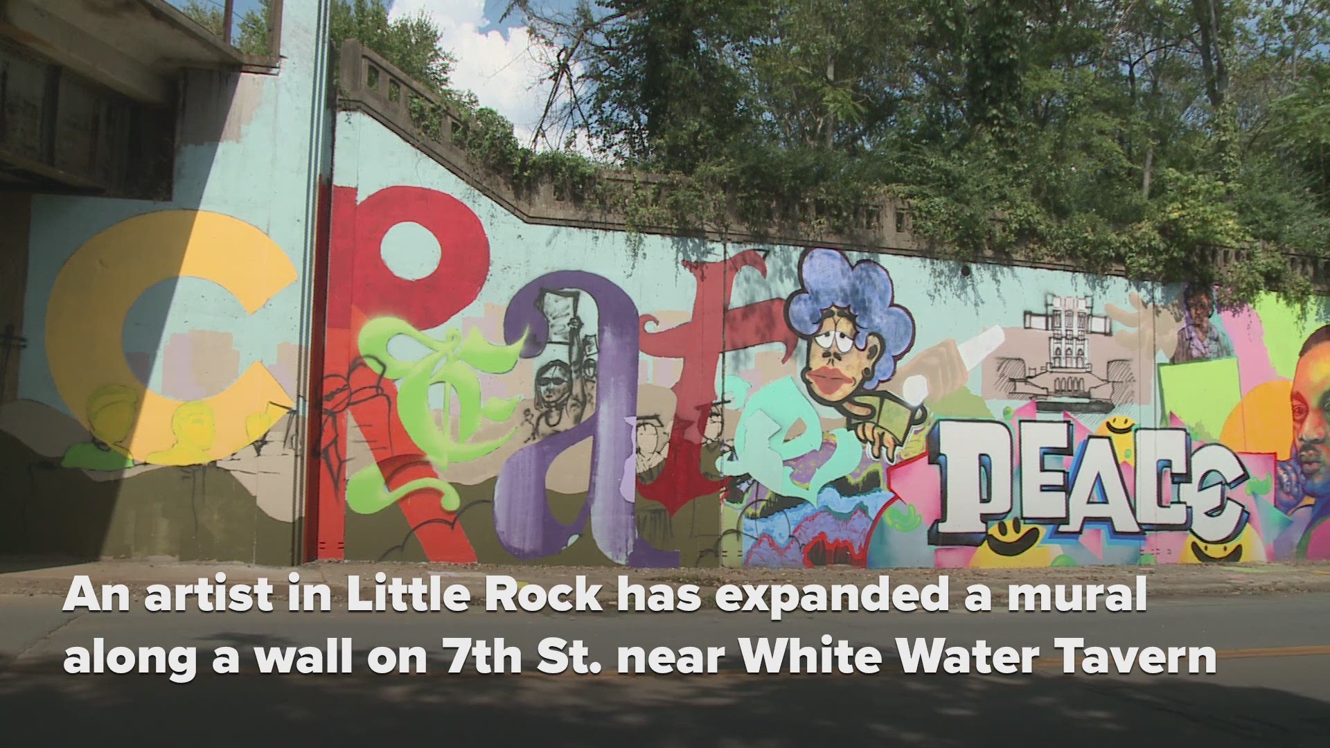 The mural was expanded on West 7th Street near White Water Tavern as part of Arkansas Peace Week, which coincides with the United Nation's Day of Peace in the 3rd week of September.
