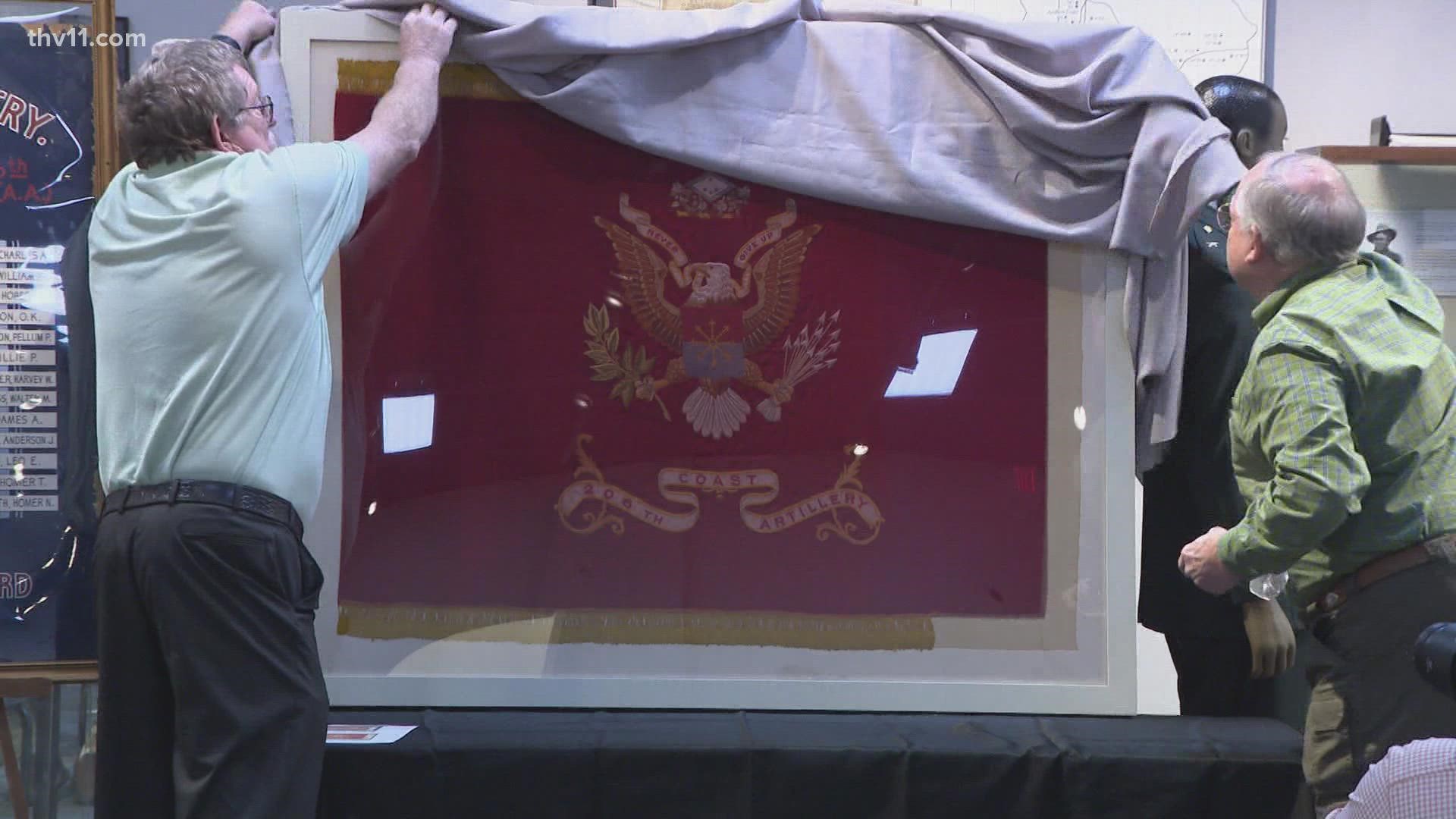 The National Guard museum unveils the '206th Coast Artillery's' colors. The 206th was an Arkansas National Guard Unit that was attacked by the Japanese in WWII.