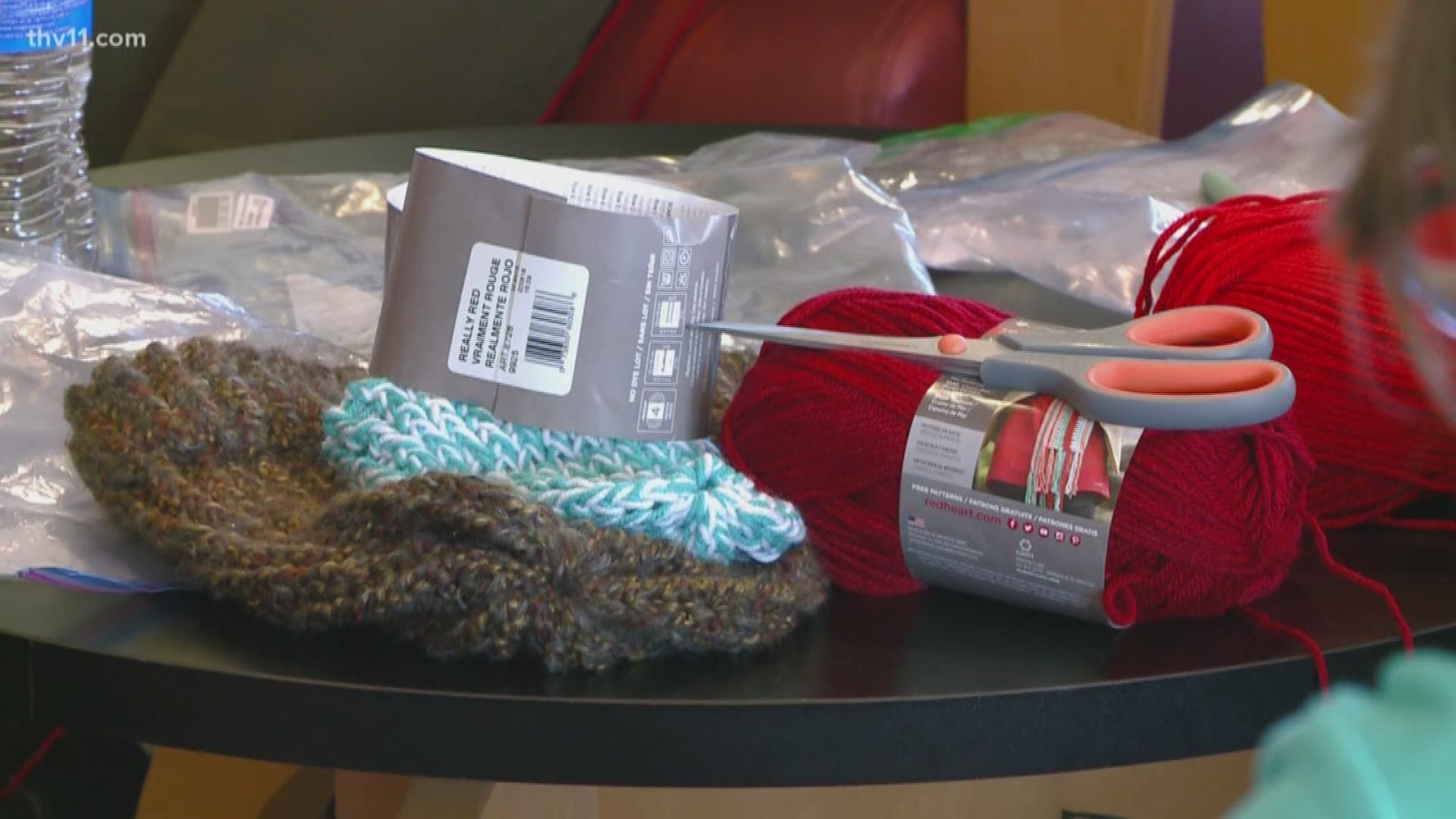 The "Knitting for a Cause" community project at the Main Branch of the Laman Library in North Little Rock usually knits hats for the homeless.