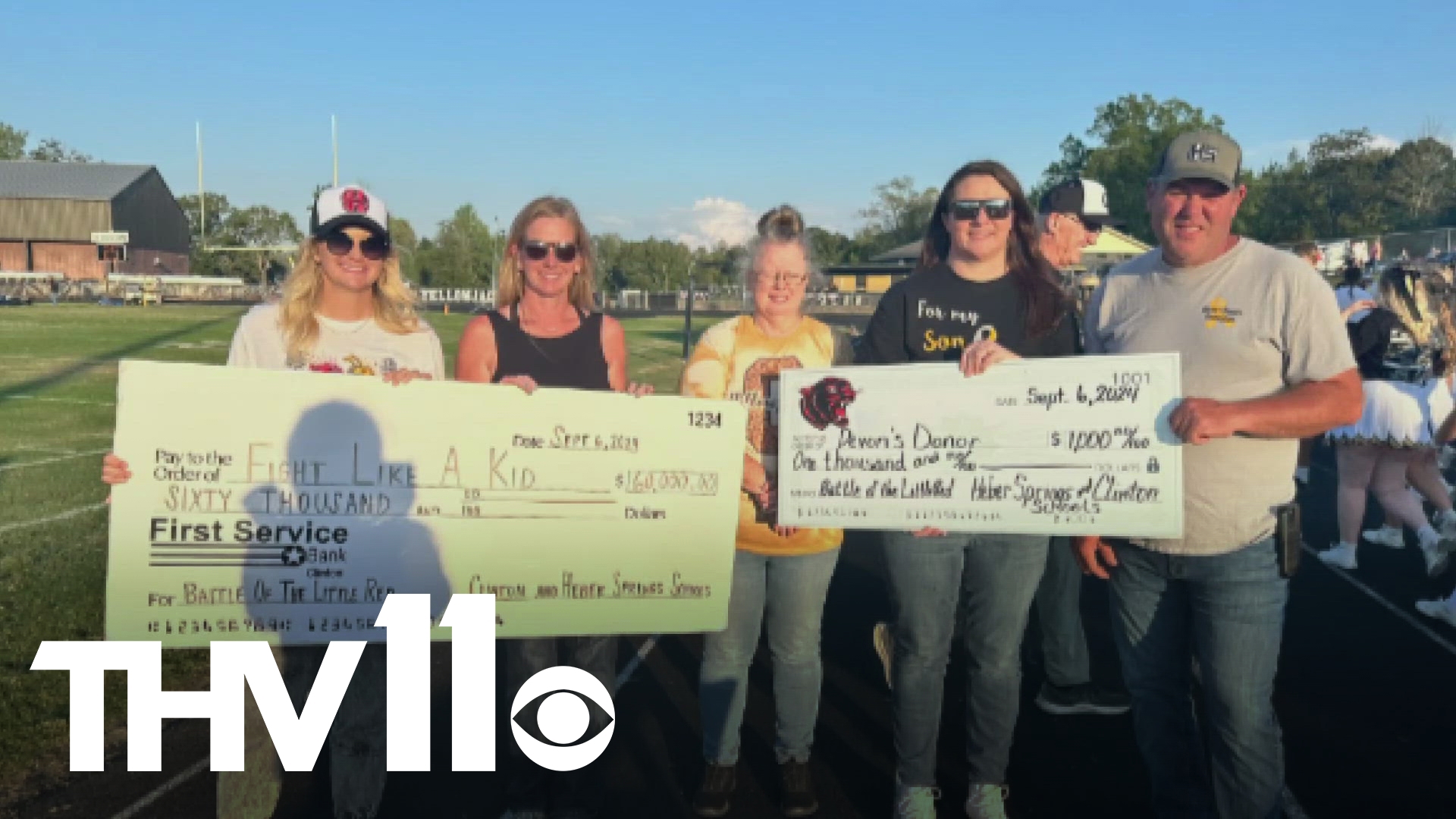 In a remarkable act of kindness, an anonymous Arkansas man donated $50K to support childhood cancer charities during the Battle of the Little Red rivalry.