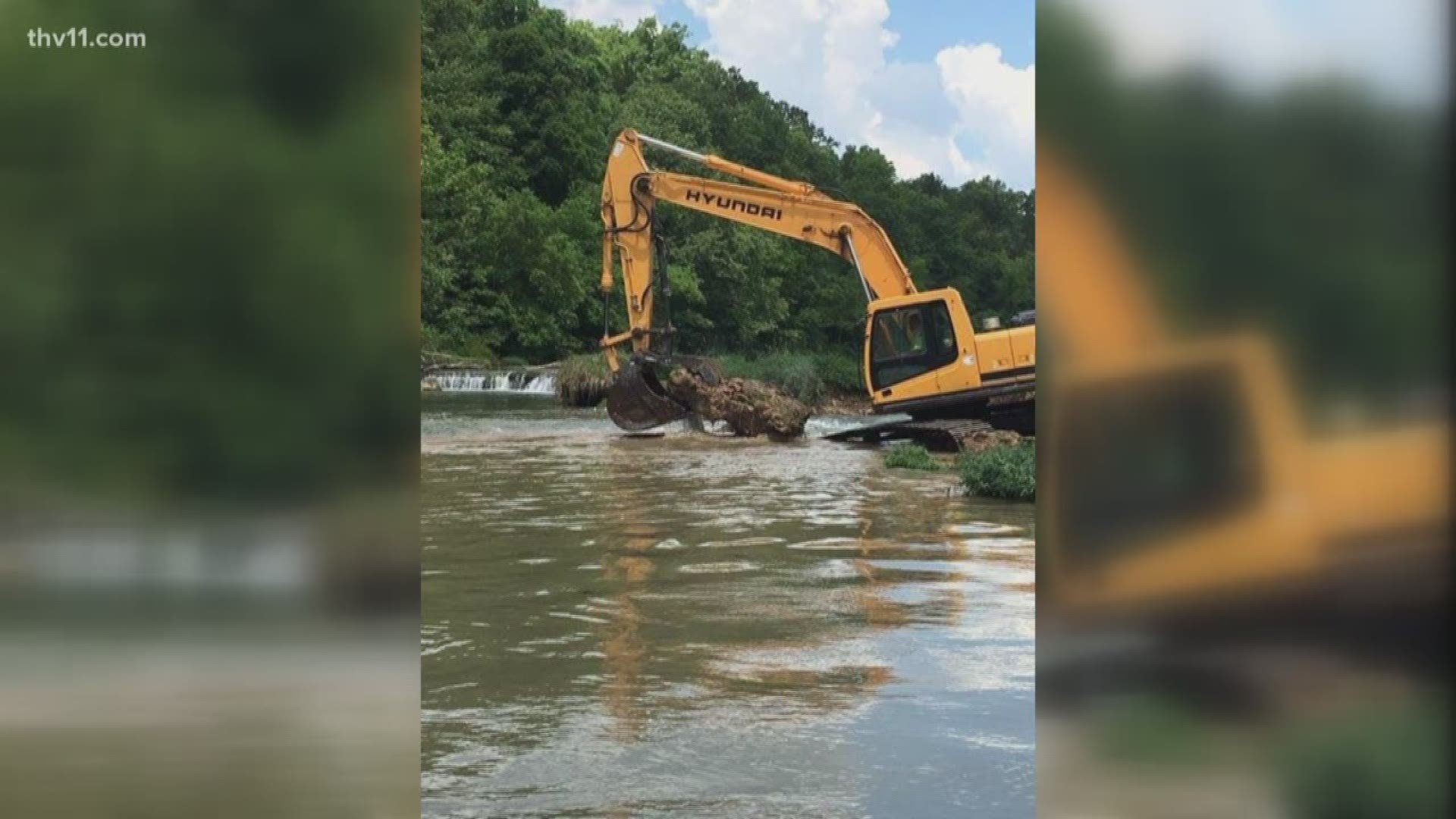 State and Fulton County officials announced that they have closed the sinkhole that killed a man last month on the Spring River.