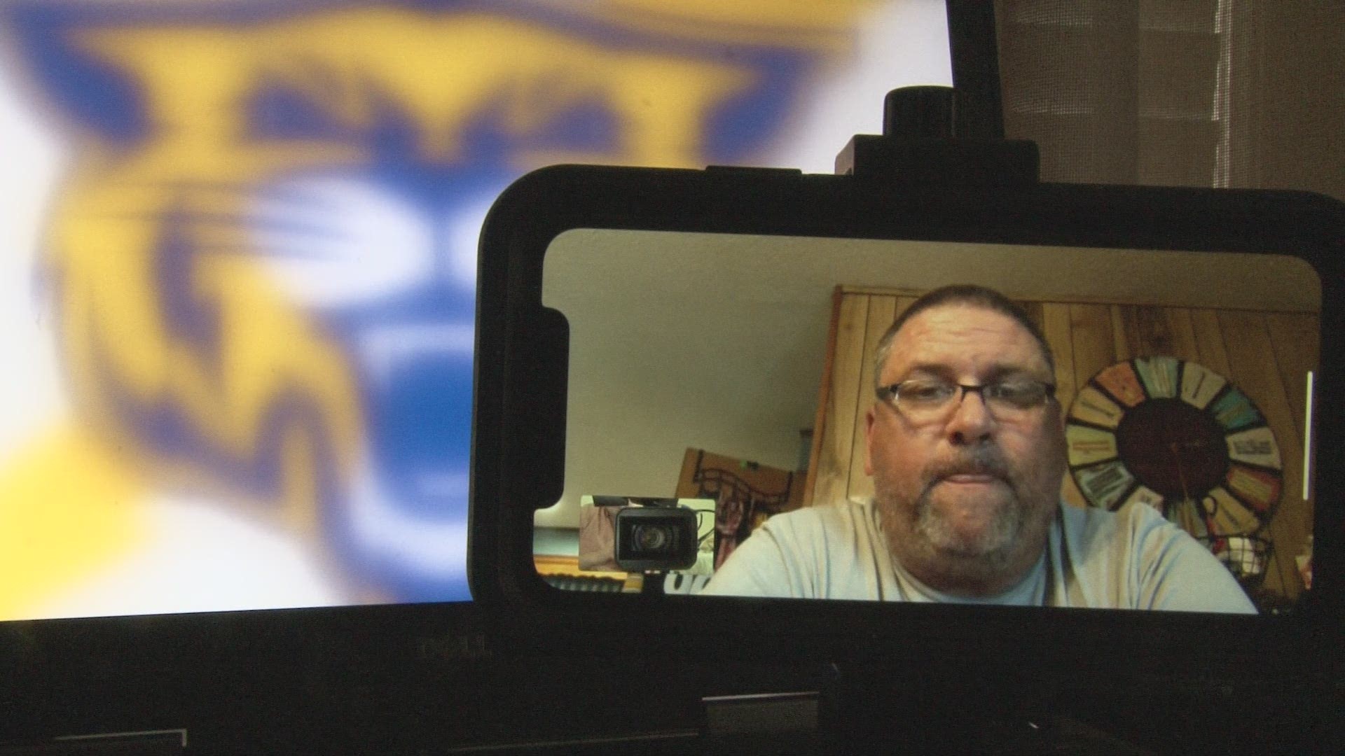 NLR head basketball coach Johnny Rice coaching from home